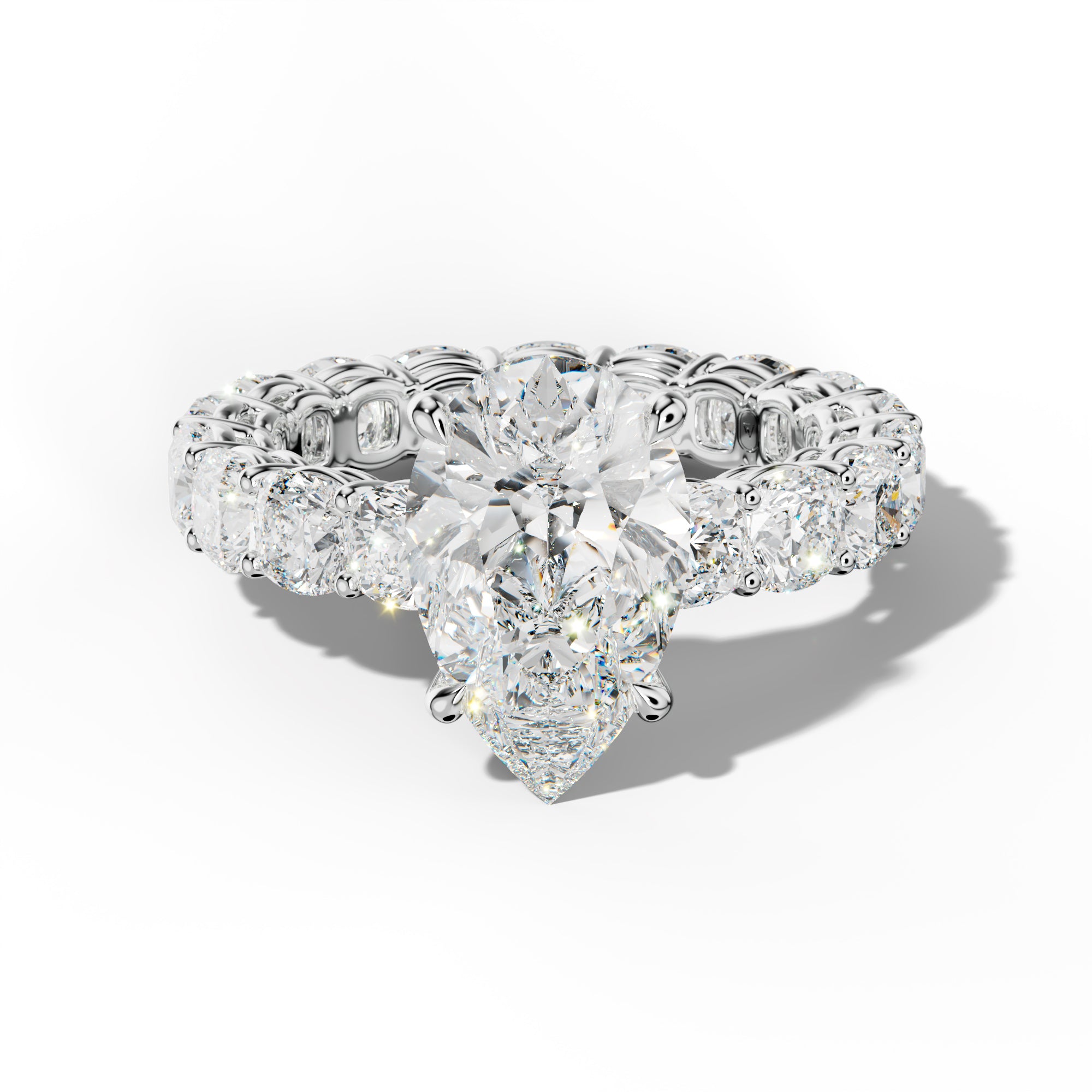Celine Pear Shape Engagement Ring With Cushion Side Stones