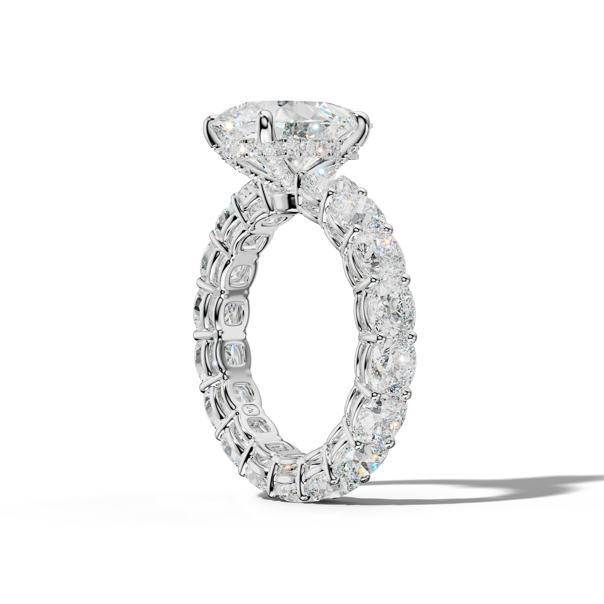 Celine Pear Shape Engagement Ring With Cushion Side Stones
