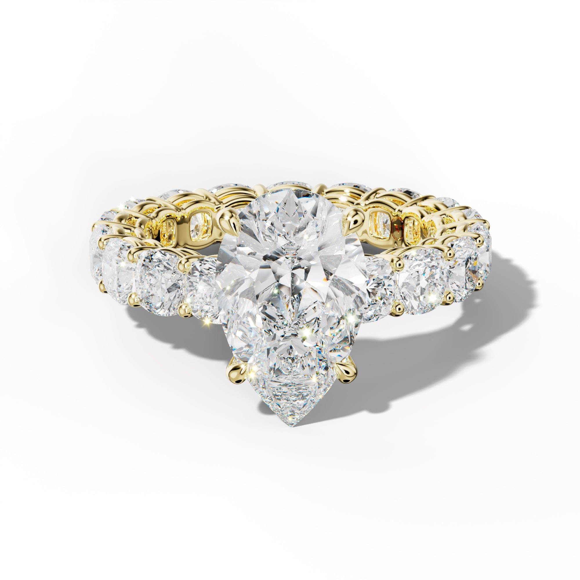 Celine Pear Shape Engagement Ring With Cushion Side Stones