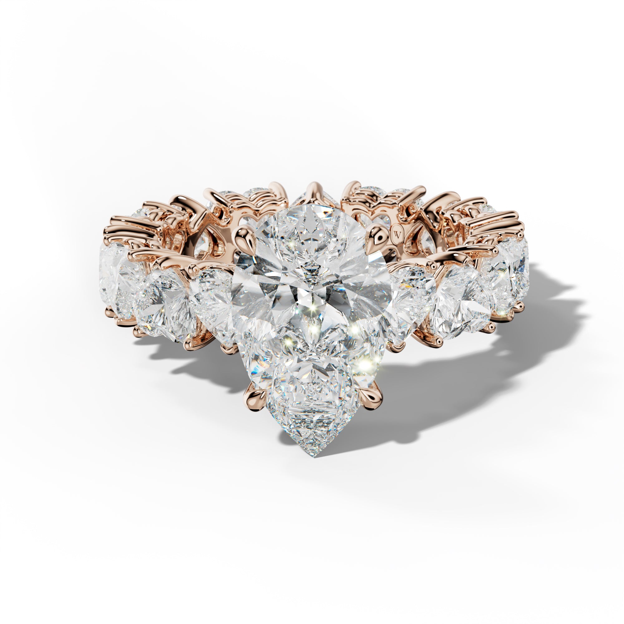 Melany Pear Shape Engagement Ring With Heart Side Stones