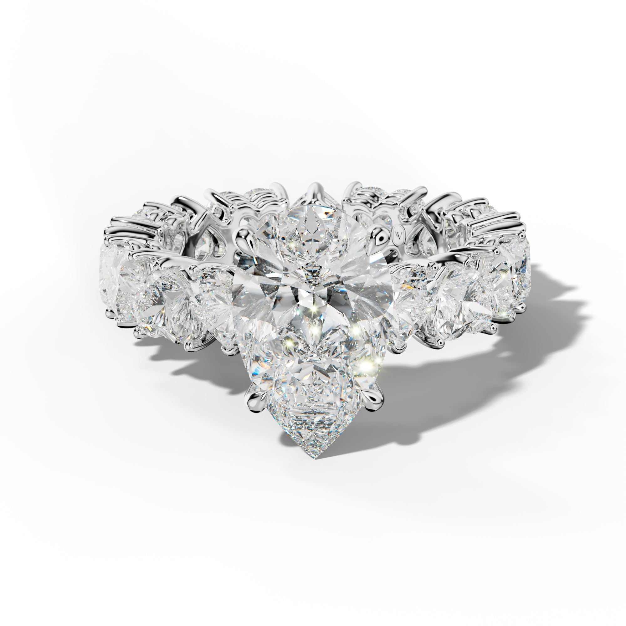 Melany Pear Shape Engagement Ring With Heart Side Stones