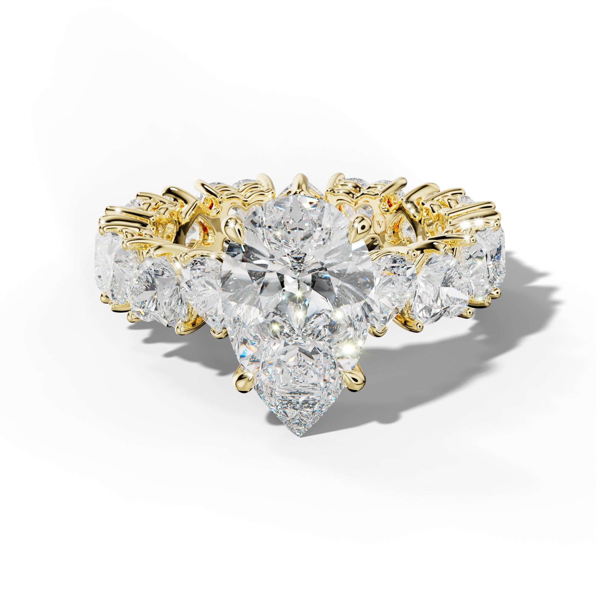Melany Pear Shape Engagement Ring With Heart Side Stones