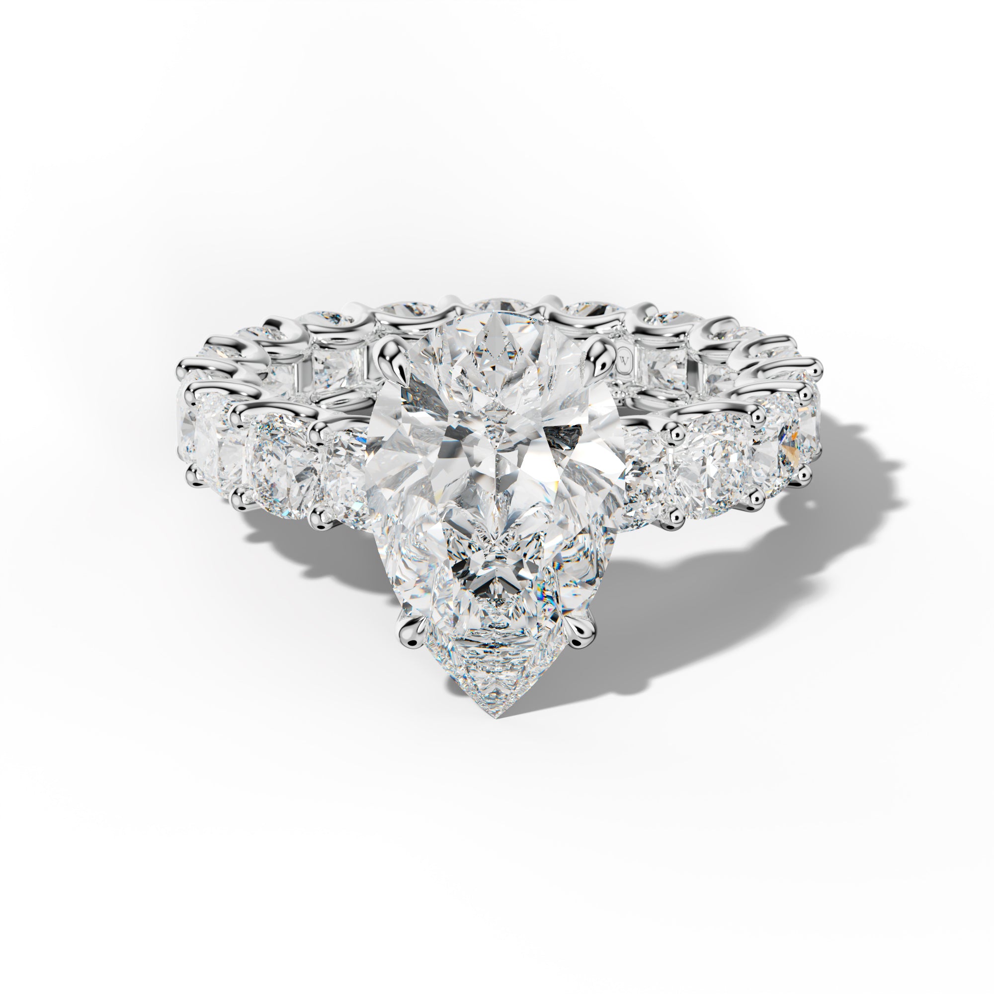 Karla Pear Shape Engagement Ring With Cushion Side Stones