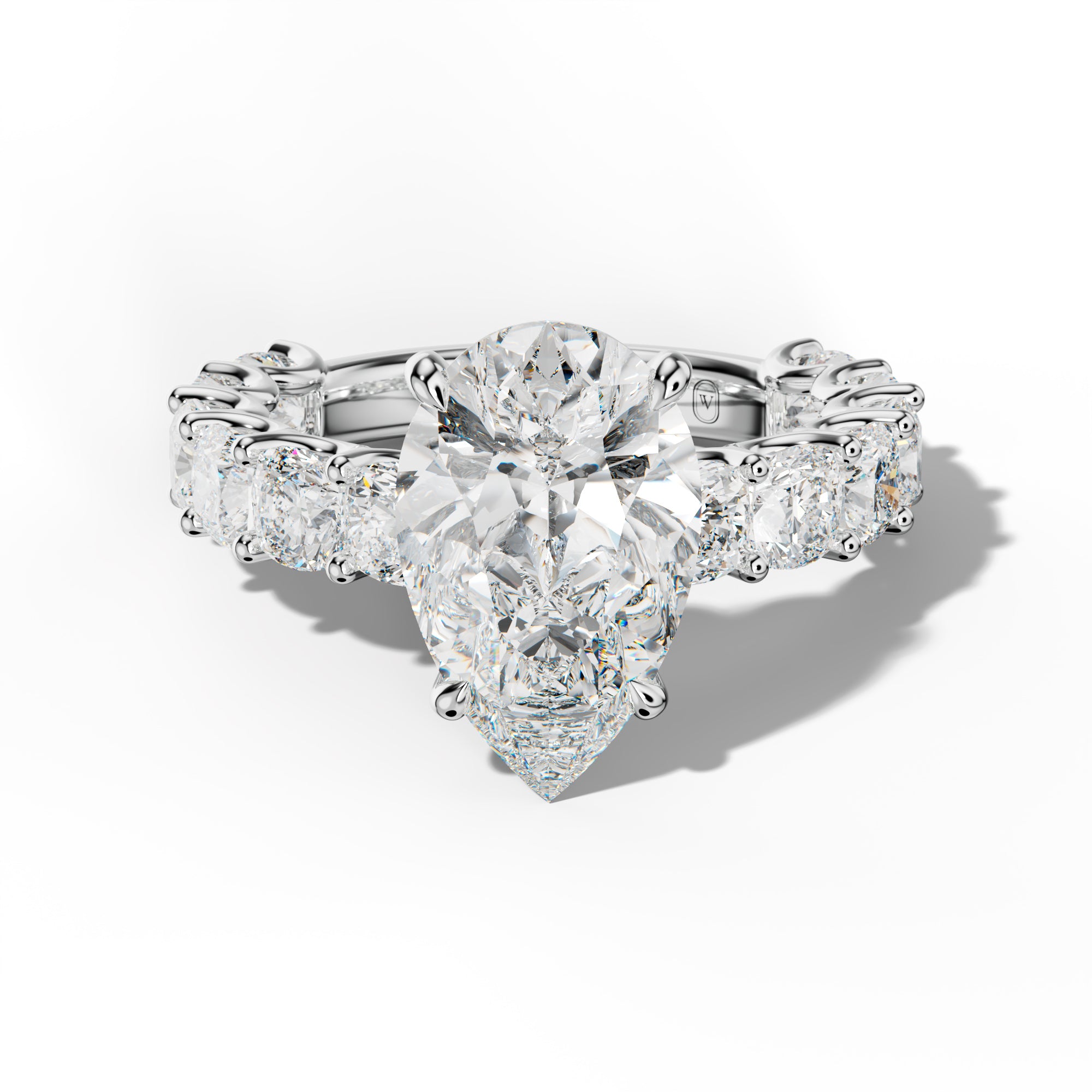 Daniela Pear Shape Engagement Ring With Cushion Side Stones
