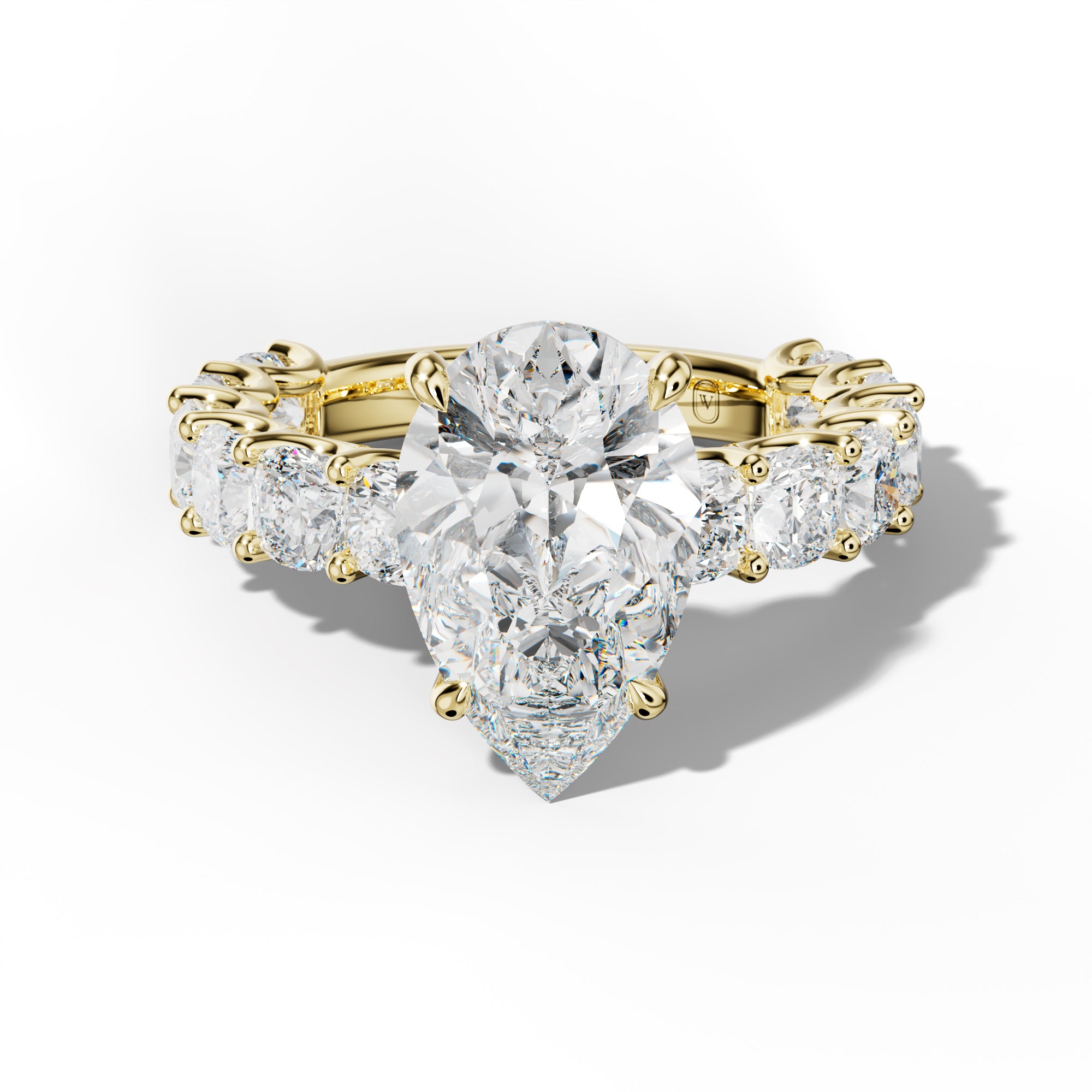 Daniela Pear Shape Engagement Ring With Cushion Side Stones