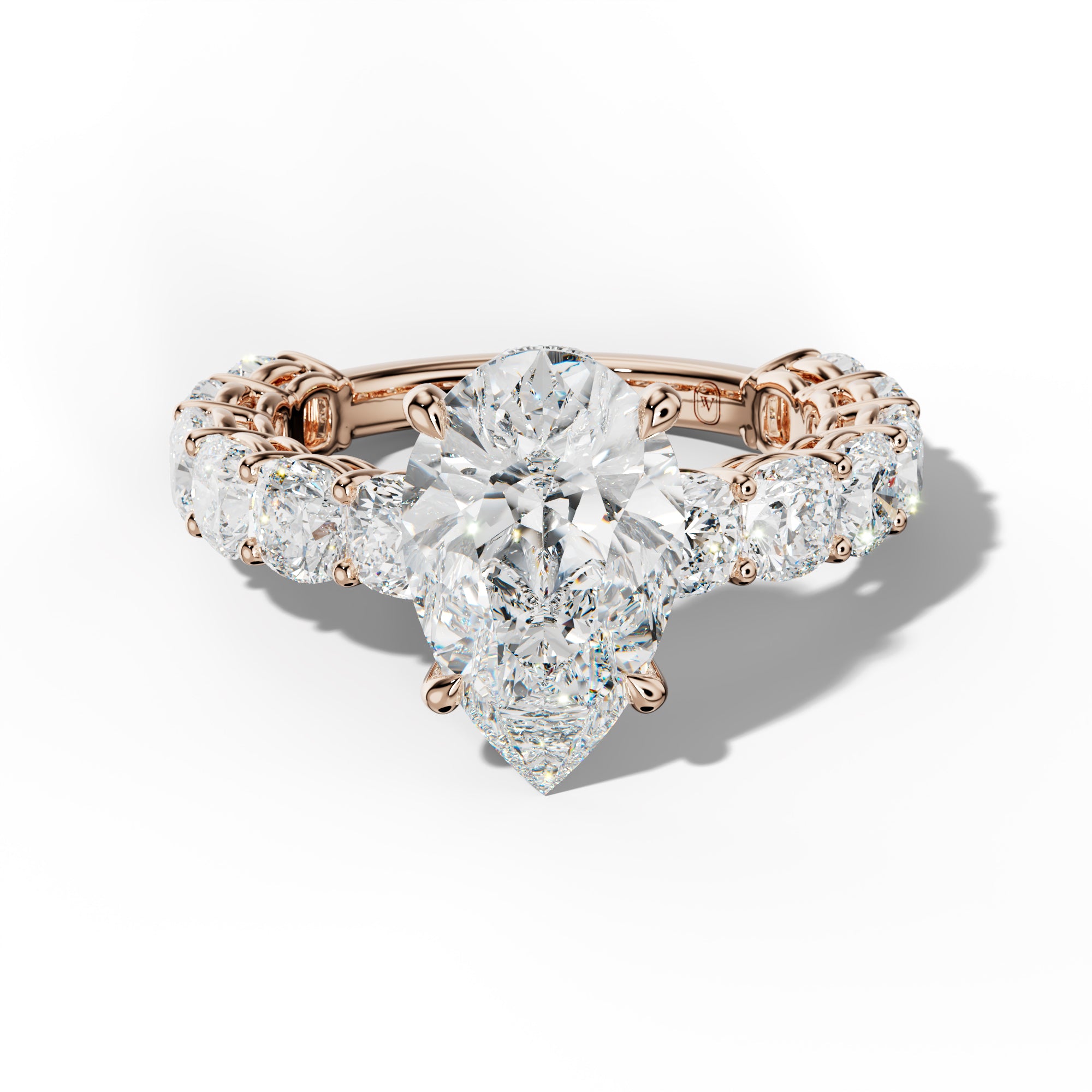 Bailey Pear Shape Engagement Ring With Cushion Side Stones