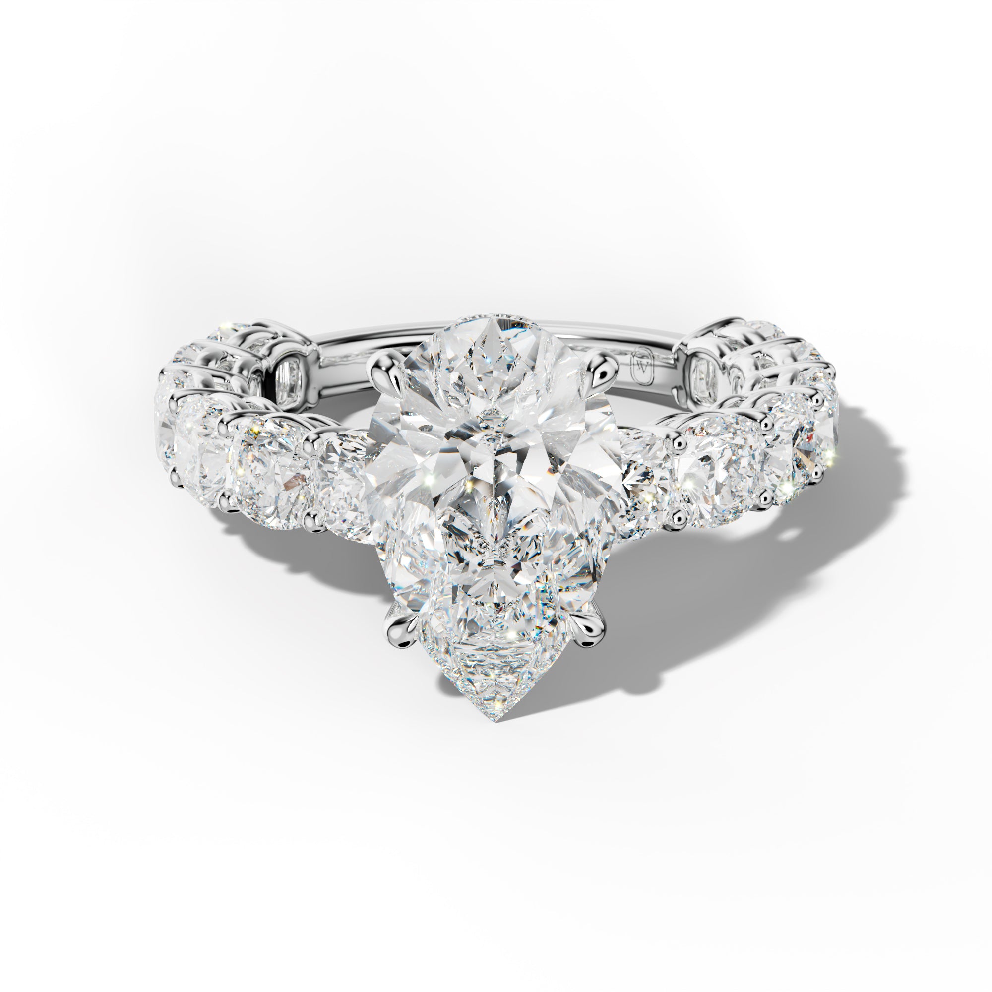 Bailey Pear Shape Engagement Ring With Cushion Side Stones