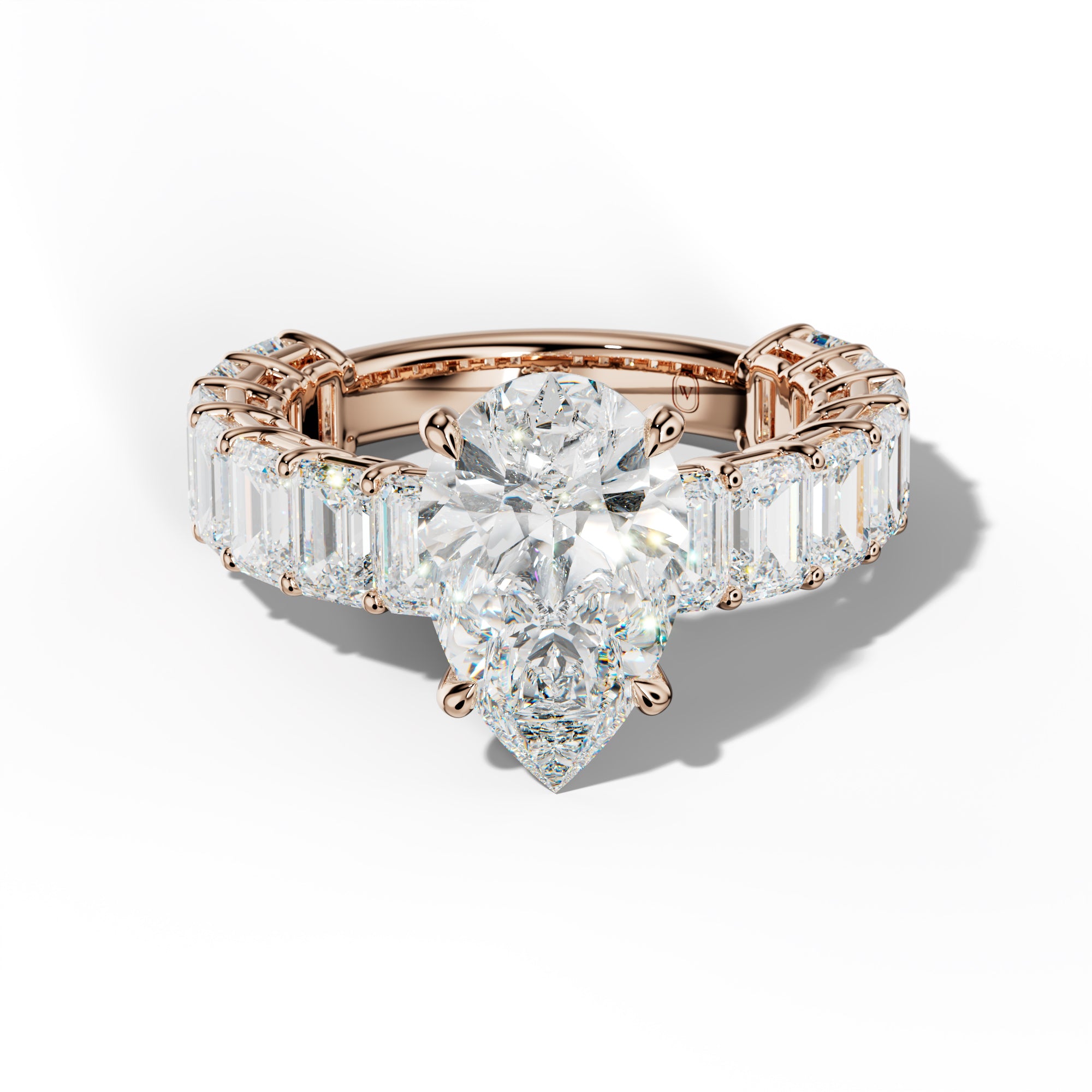 Mina Pear Shape Engagement Ring With Emerald Cut Side Stones