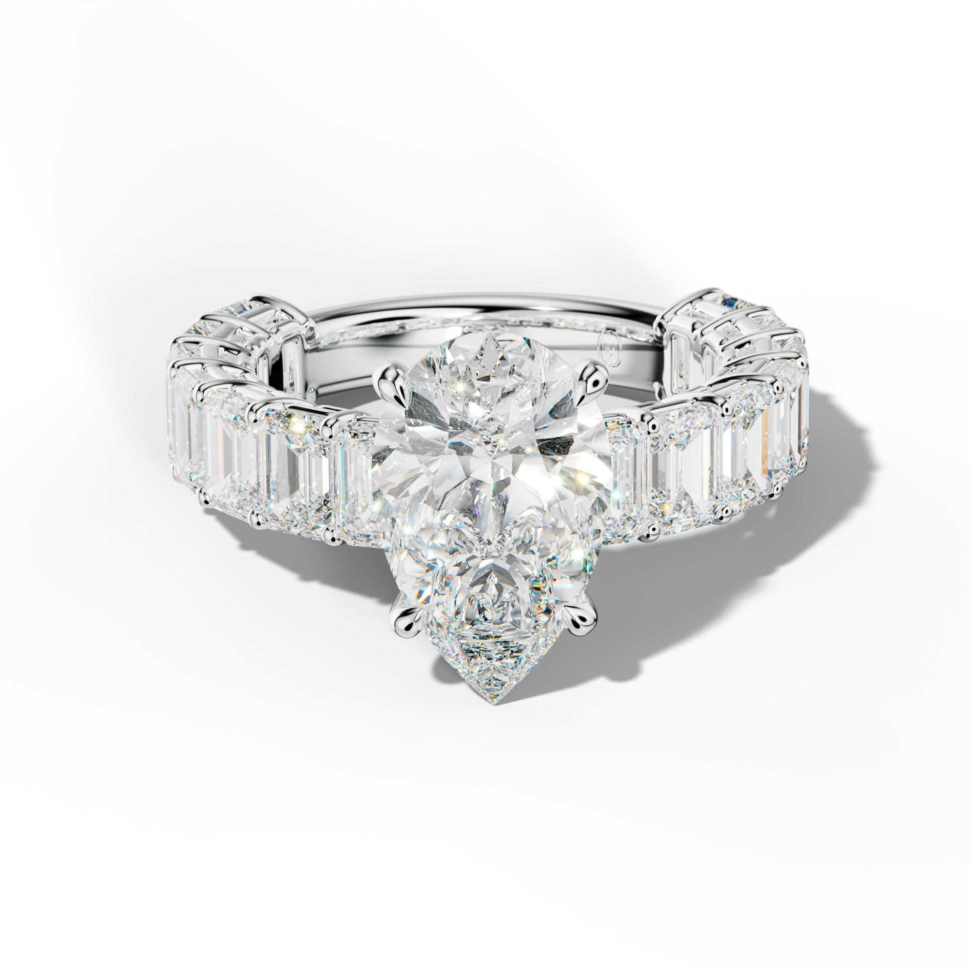 Mina Pear Shape Engagement Ring With Emerald Cut Side Stones