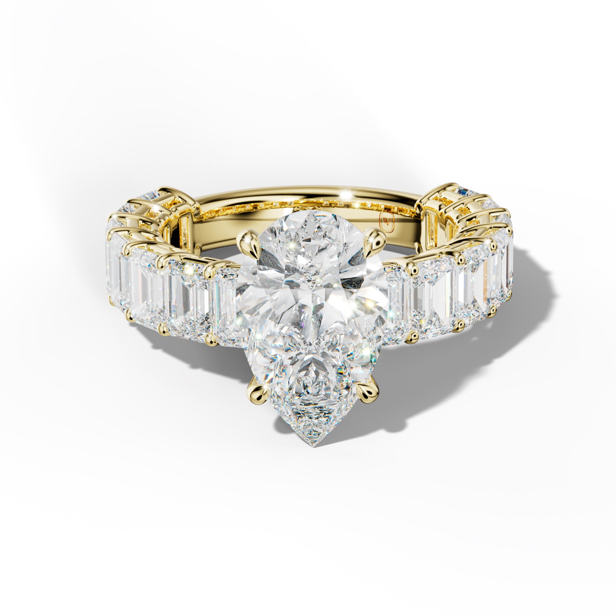 Mina Pear Shape Engagement Ring With Emerald Cut Side Stones