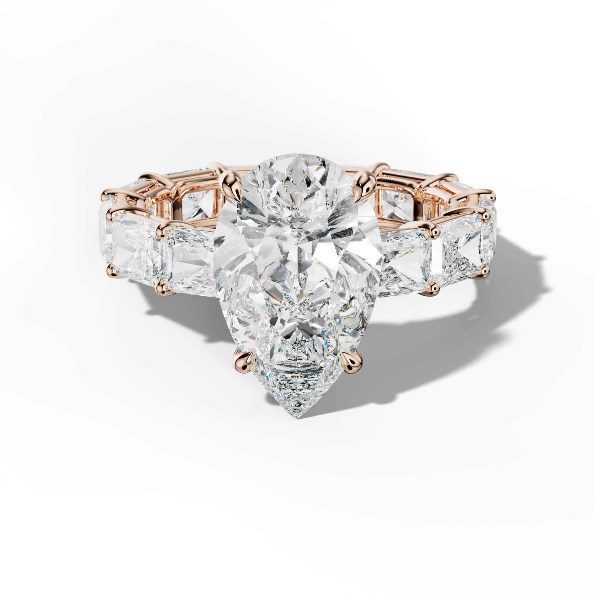 Mavis Pear Shape Engagement Ring With East West Radiant Side Stones