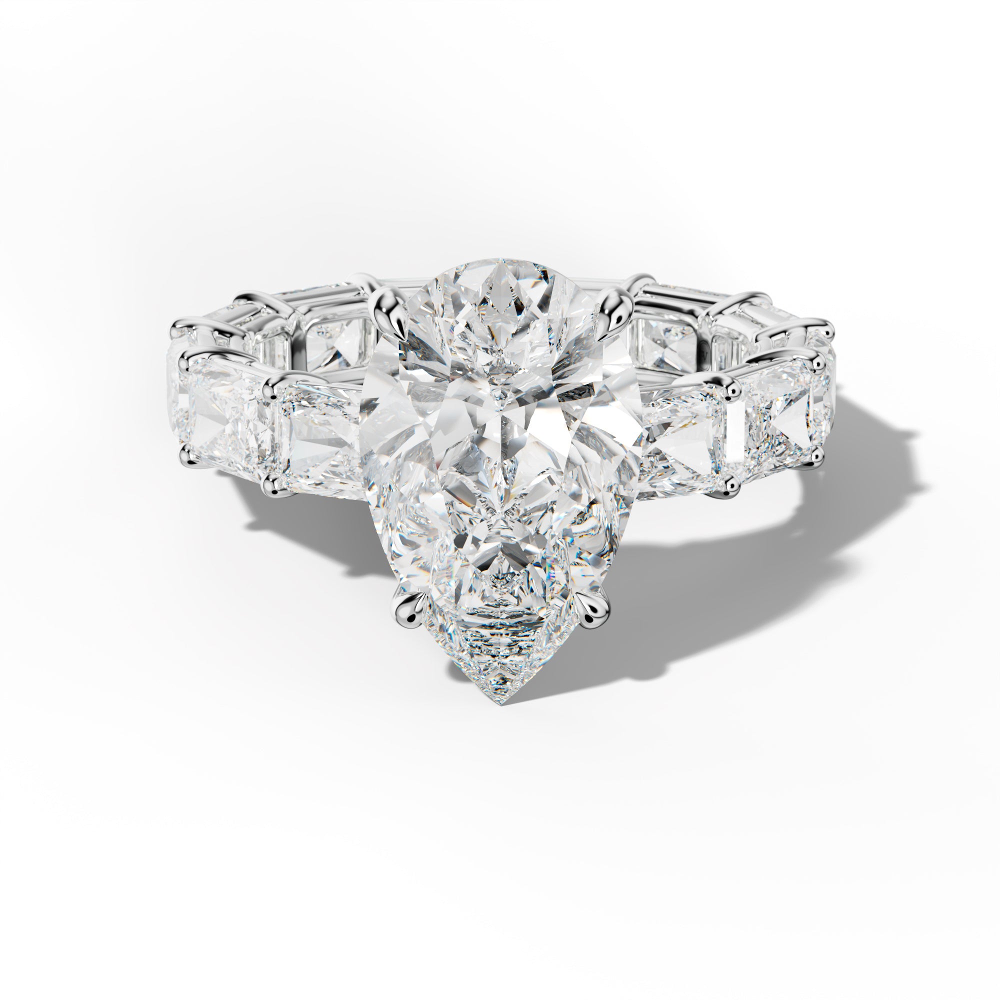 Mavis Pear Shape Engagement Ring With East West Radiant Side Stones