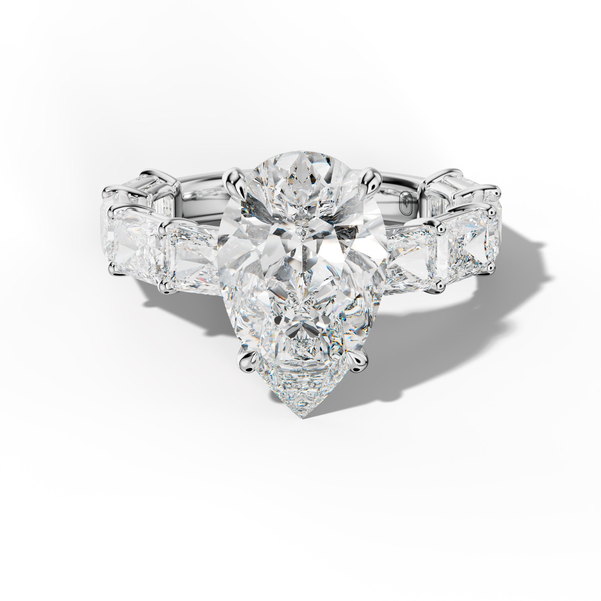 Raelynn Pear Shape Engagement Ring With East West Radiant Side Stones