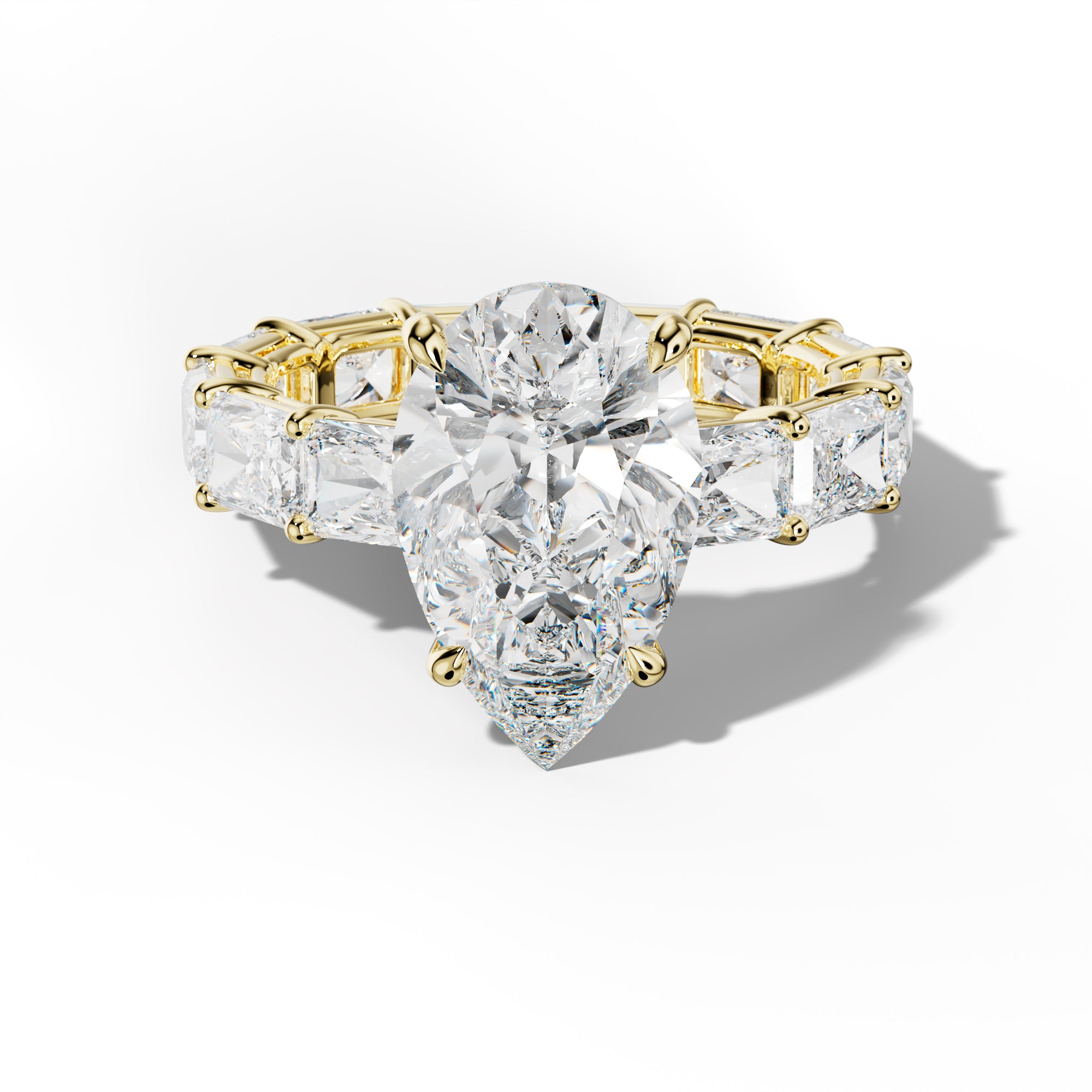 Mavis Pear Shape Engagement Ring With East West Radiant Side Stones