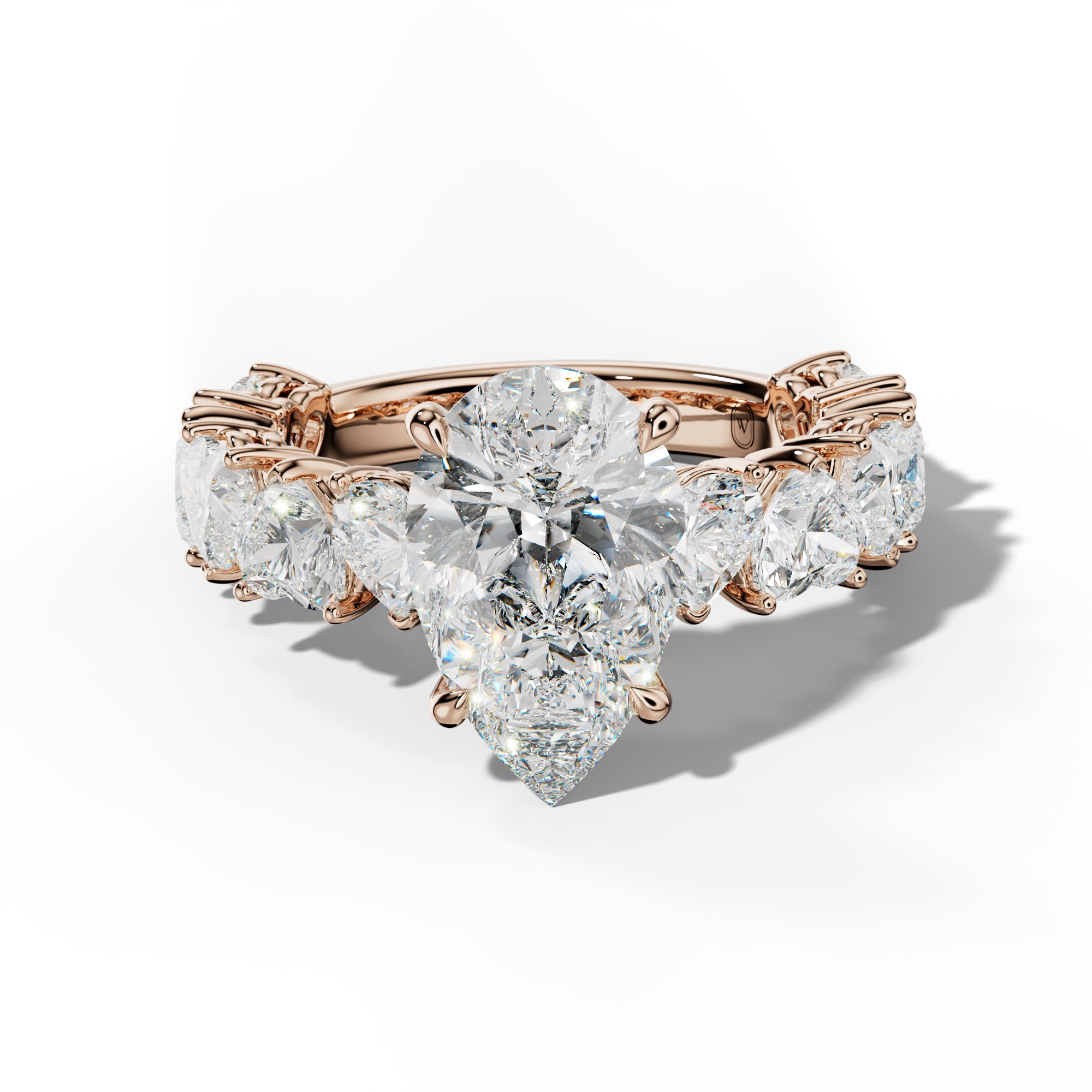 Logan Pear Shape Engagement Ring With Heart Side Stones