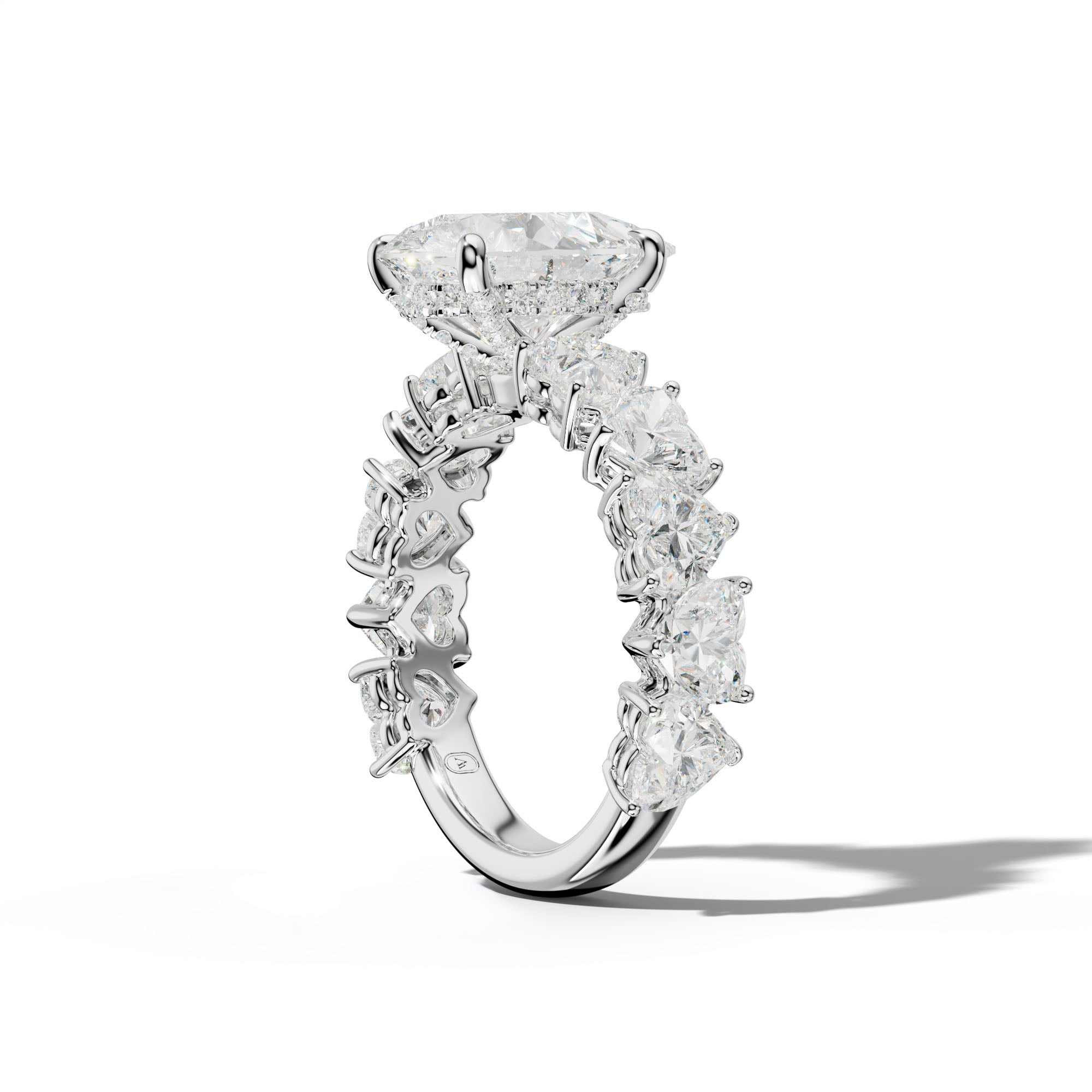 Logan Pear Shape Engagement Ring With Heart Side Stones