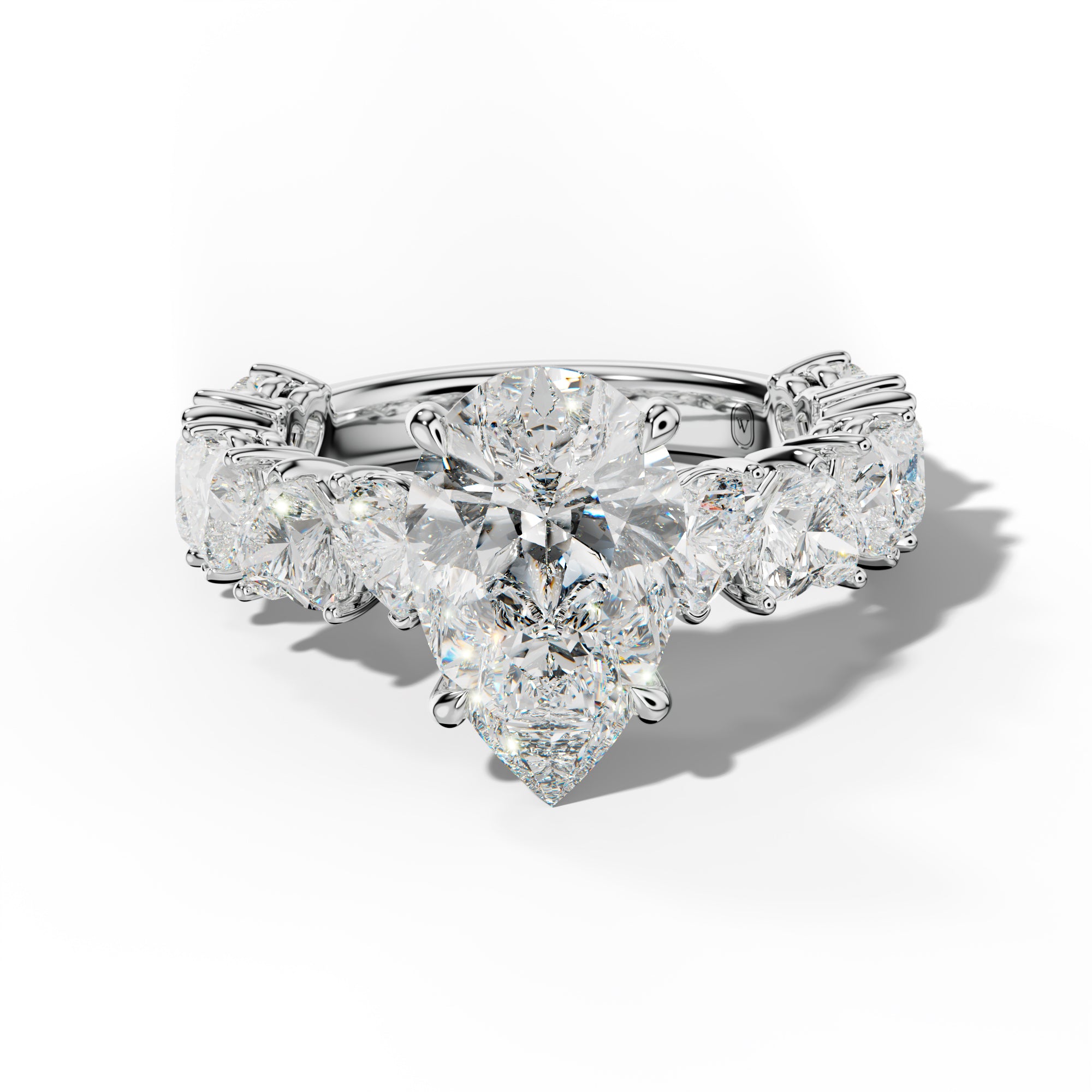 Logan Pear Shape Engagement Ring With Heart Side Stones