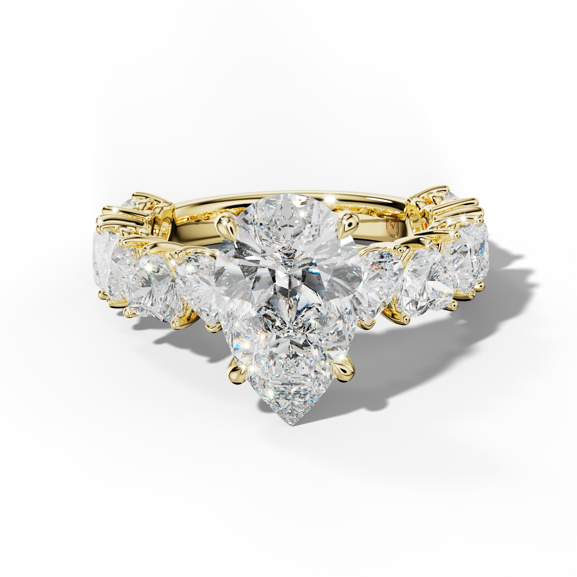 Logan Pear Shape Engagement Ring With Heart Side Stones