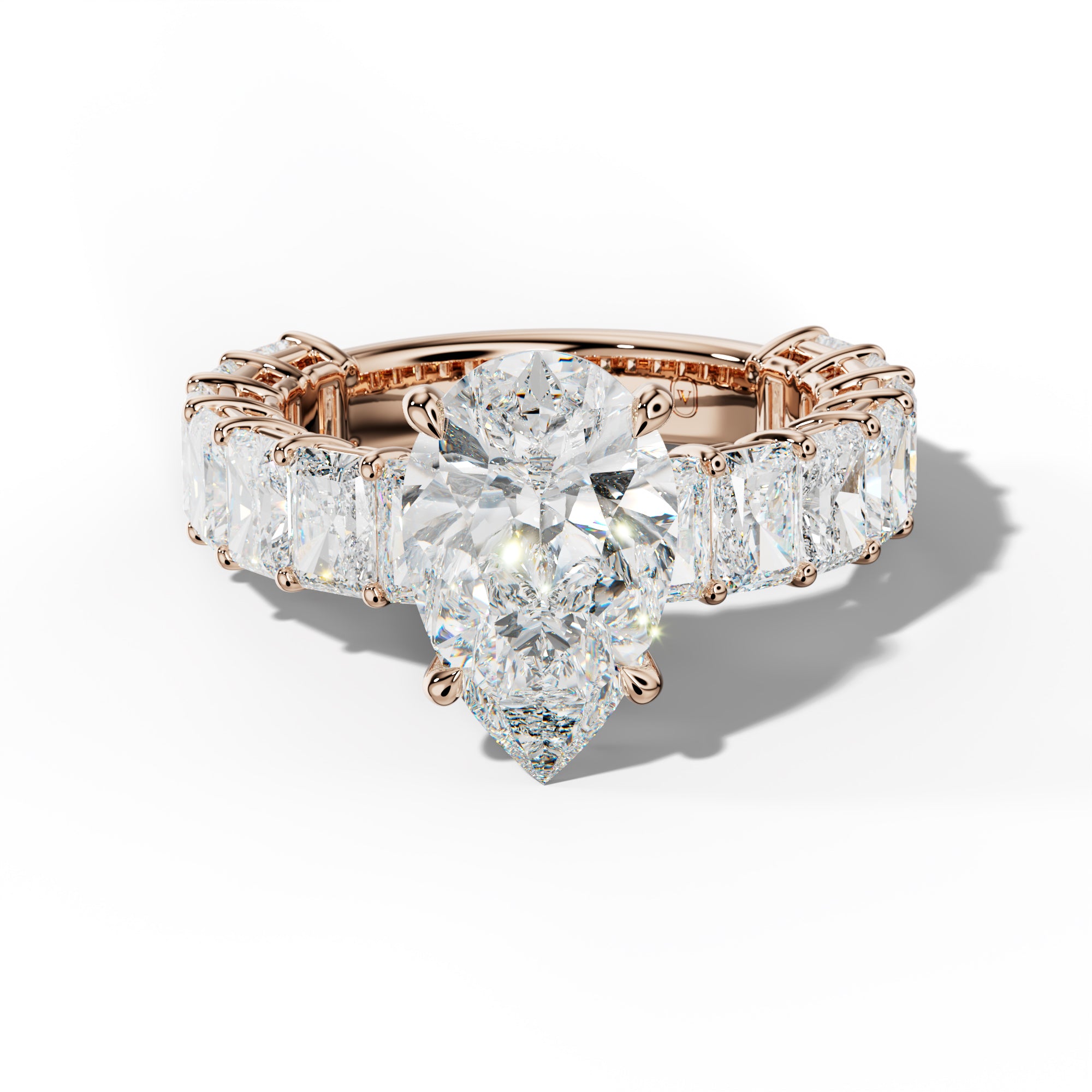 Naomi Pear Shape Engagement Ring With Radiant Side Stones