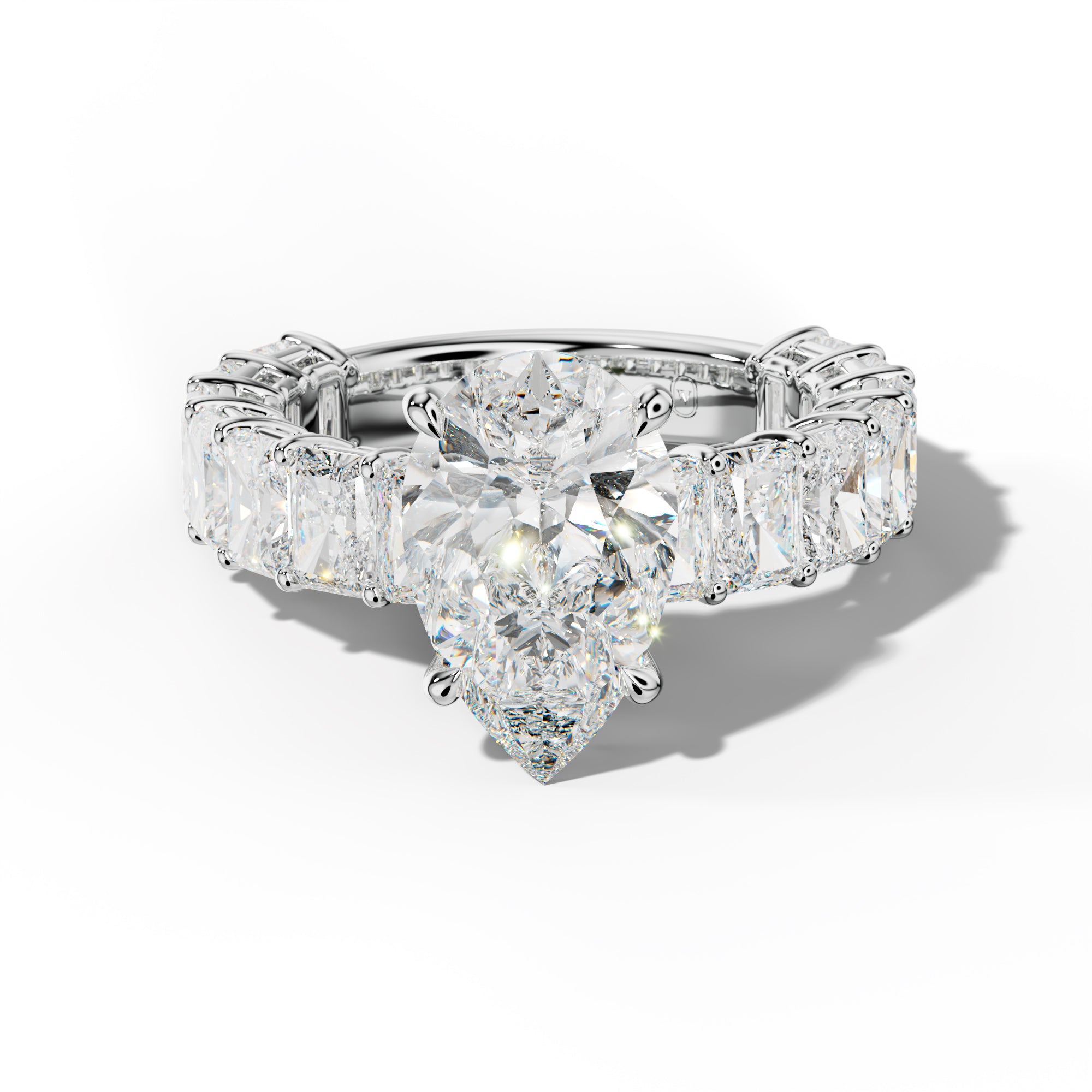 Naomi Pear Shape Engagement Ring With Radiant Side Stones