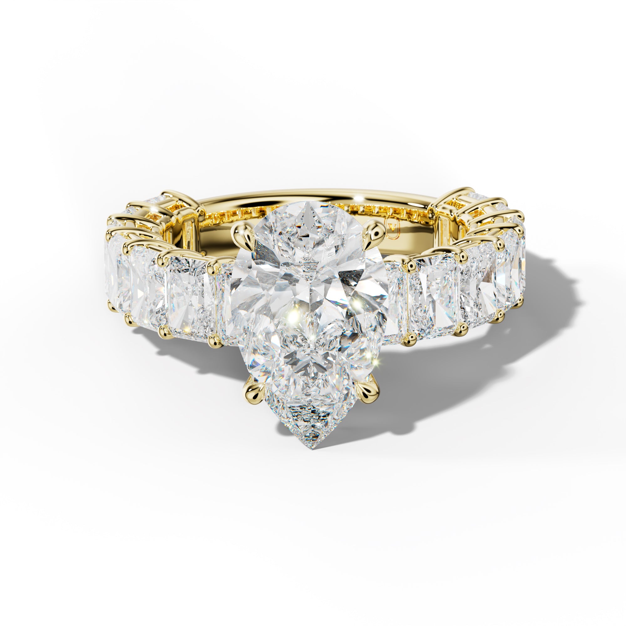 Naomi Pear Shape Engagement Ring With Radiant Side Stones