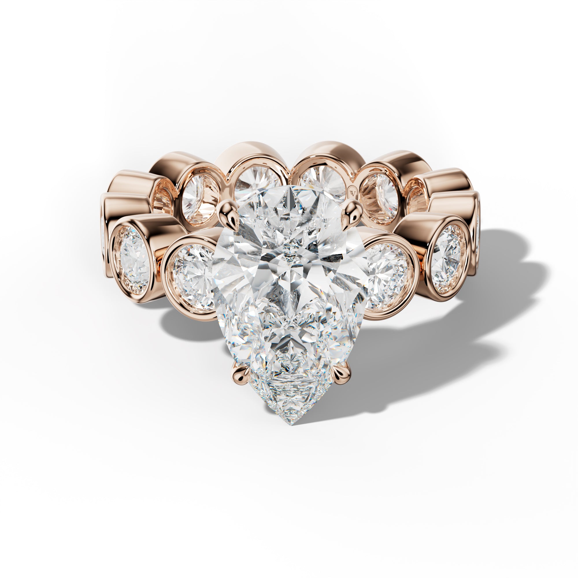 Maeve Pear Shape Engagement Ring With Round Side Stones