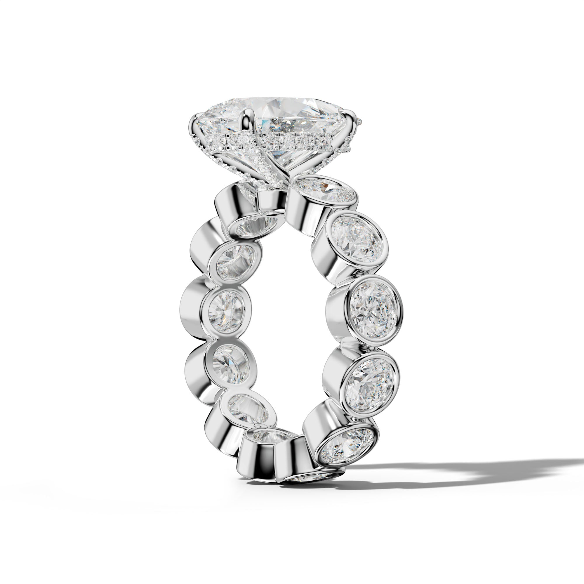 Maeve Pear Shape Engagement Ring With Round Side Stones