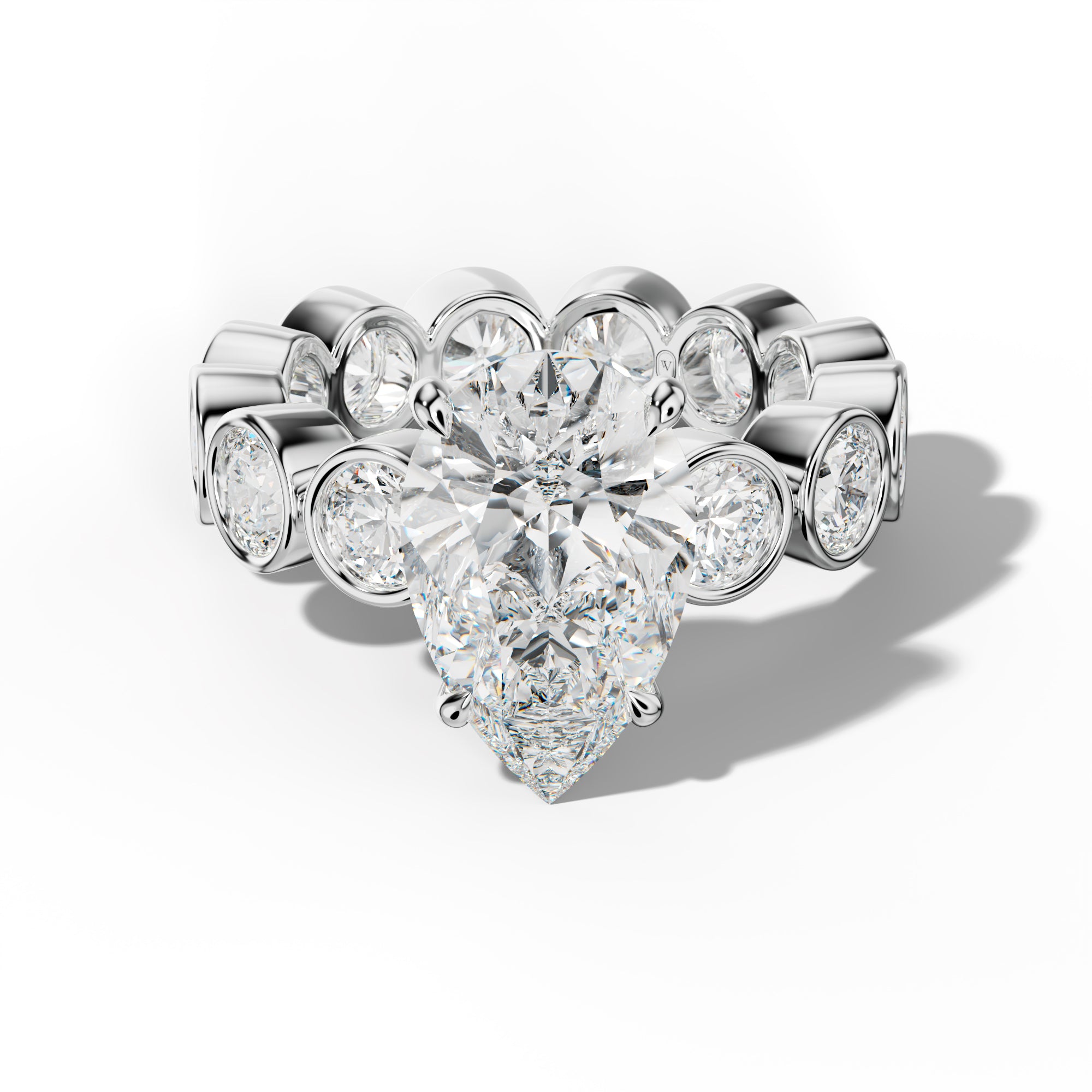 Maeve Pear Shape Engagement Ring With Round Side Stones