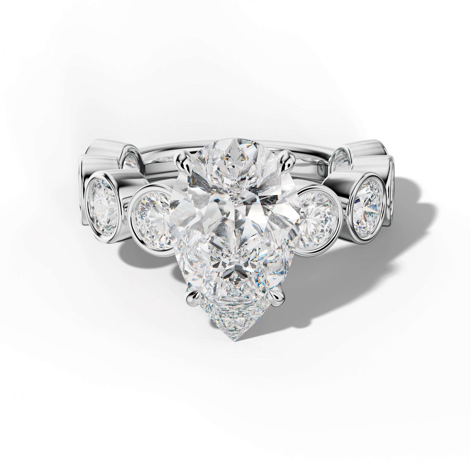 Raegan Pear Shape Engagement Ring With Round Side Stones