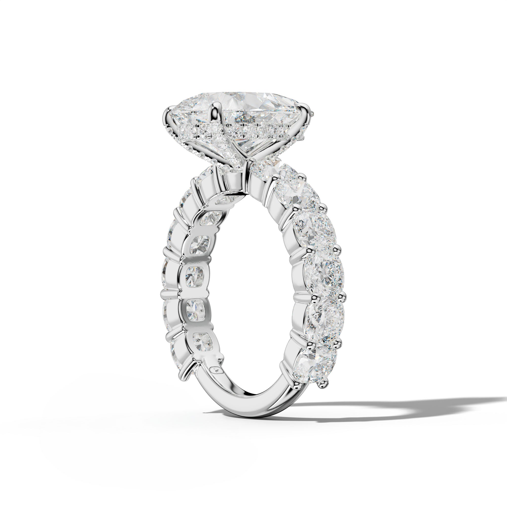 Scottie Pear Shape Engagement Ring With Cushion Side Stones