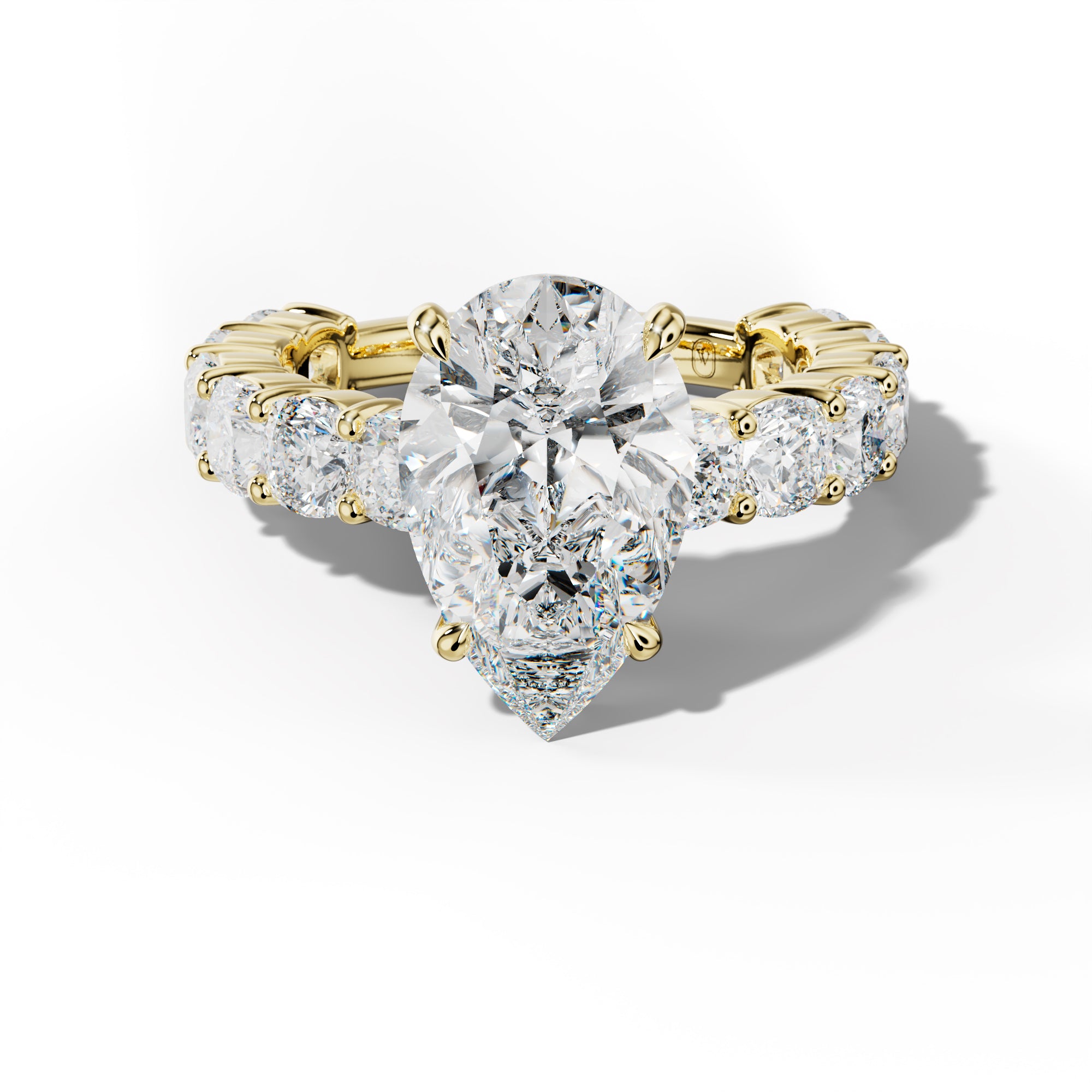 Scottie Pear Shape Engagement Ring With Cushion Side Stones