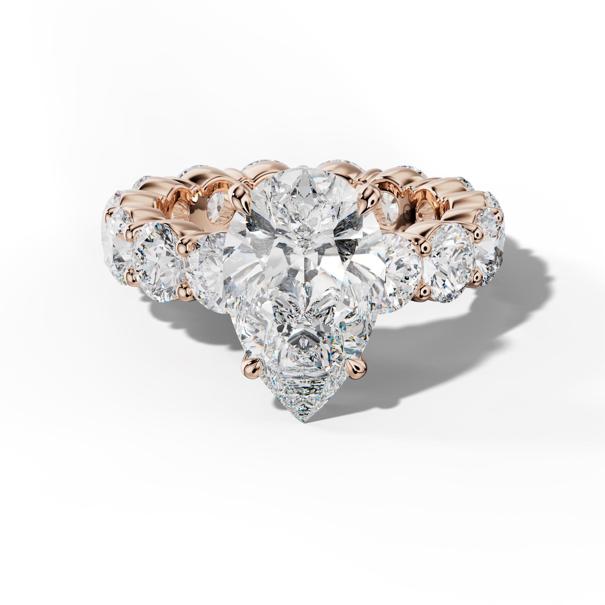 Fernanda Pear Shape Engagement Ring With Round Side Stones