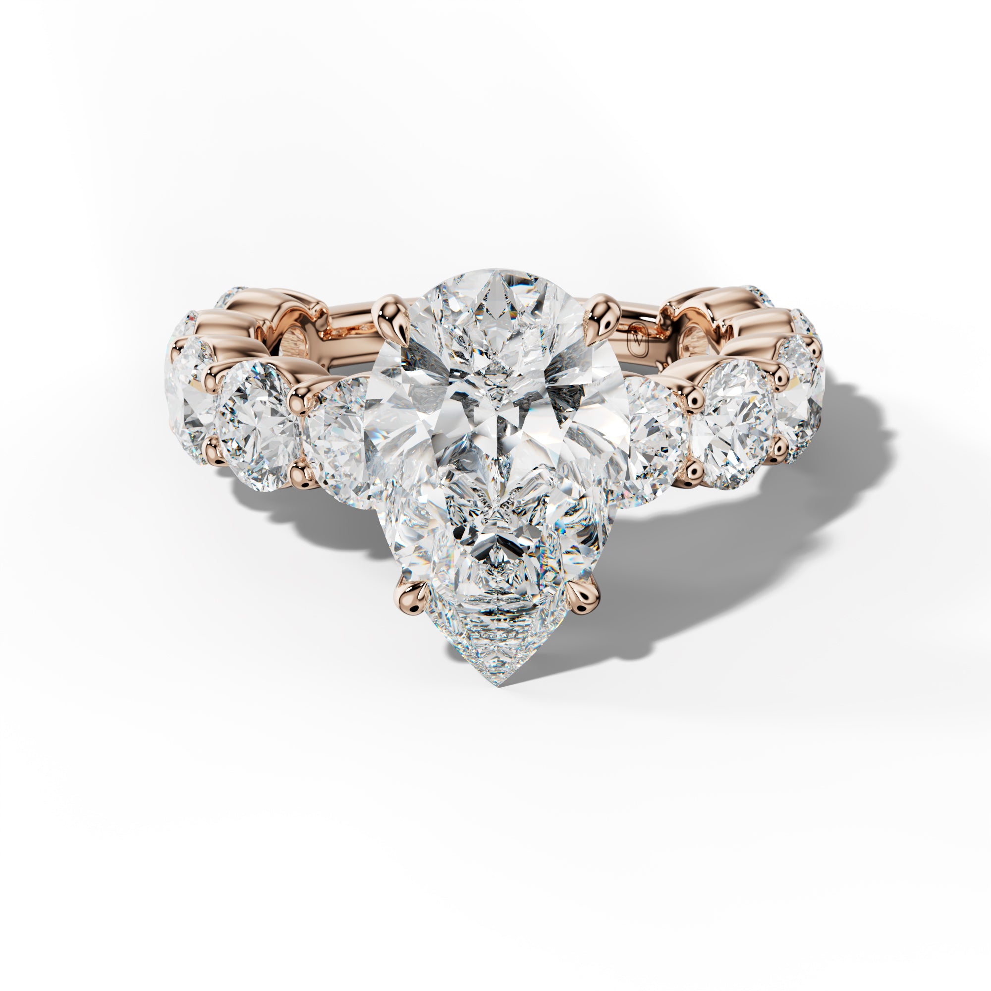 Marley Pear Shape Engagement Ring With Round Side Stones