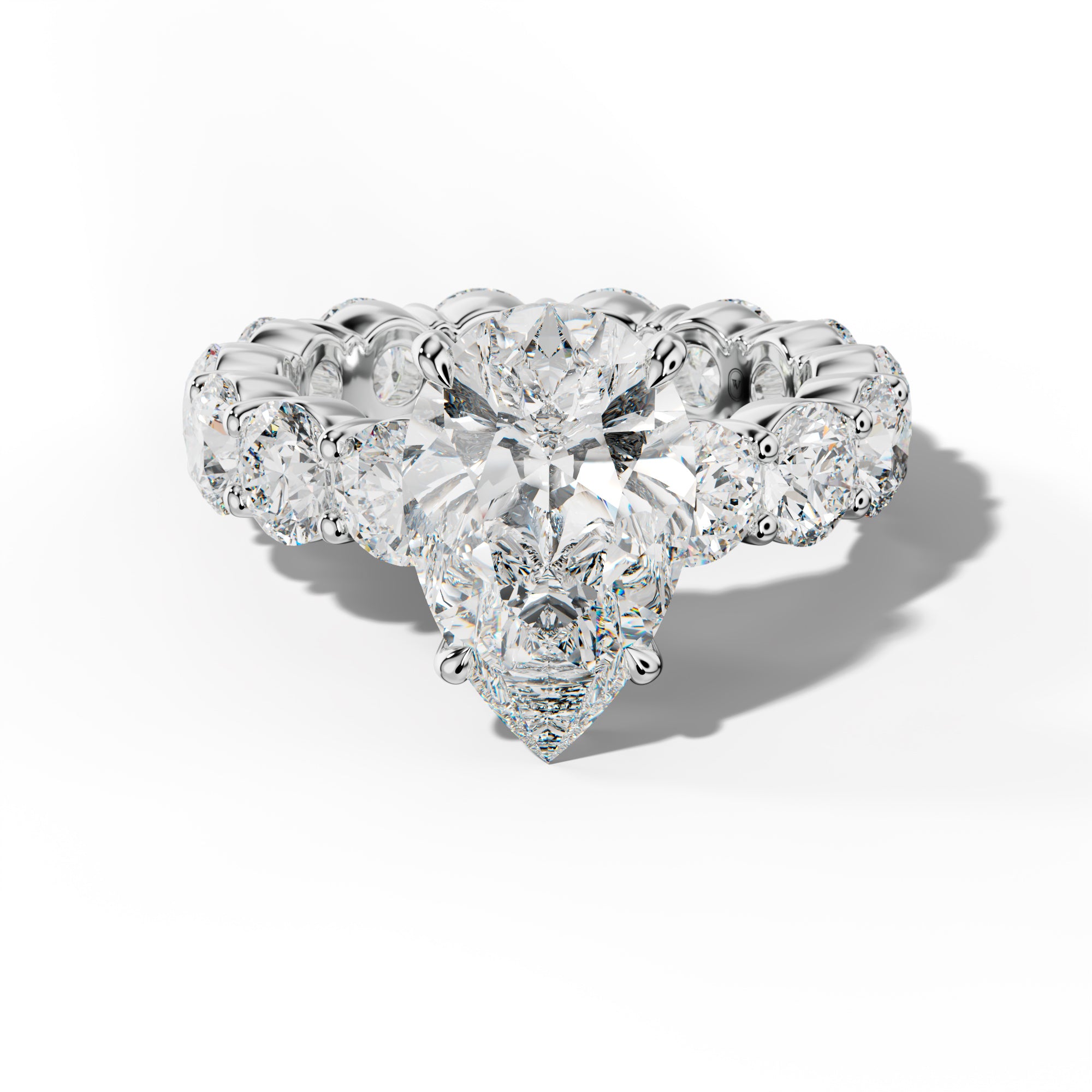 Fernanda Pear Shape Engagement Ring With Round Side Stones