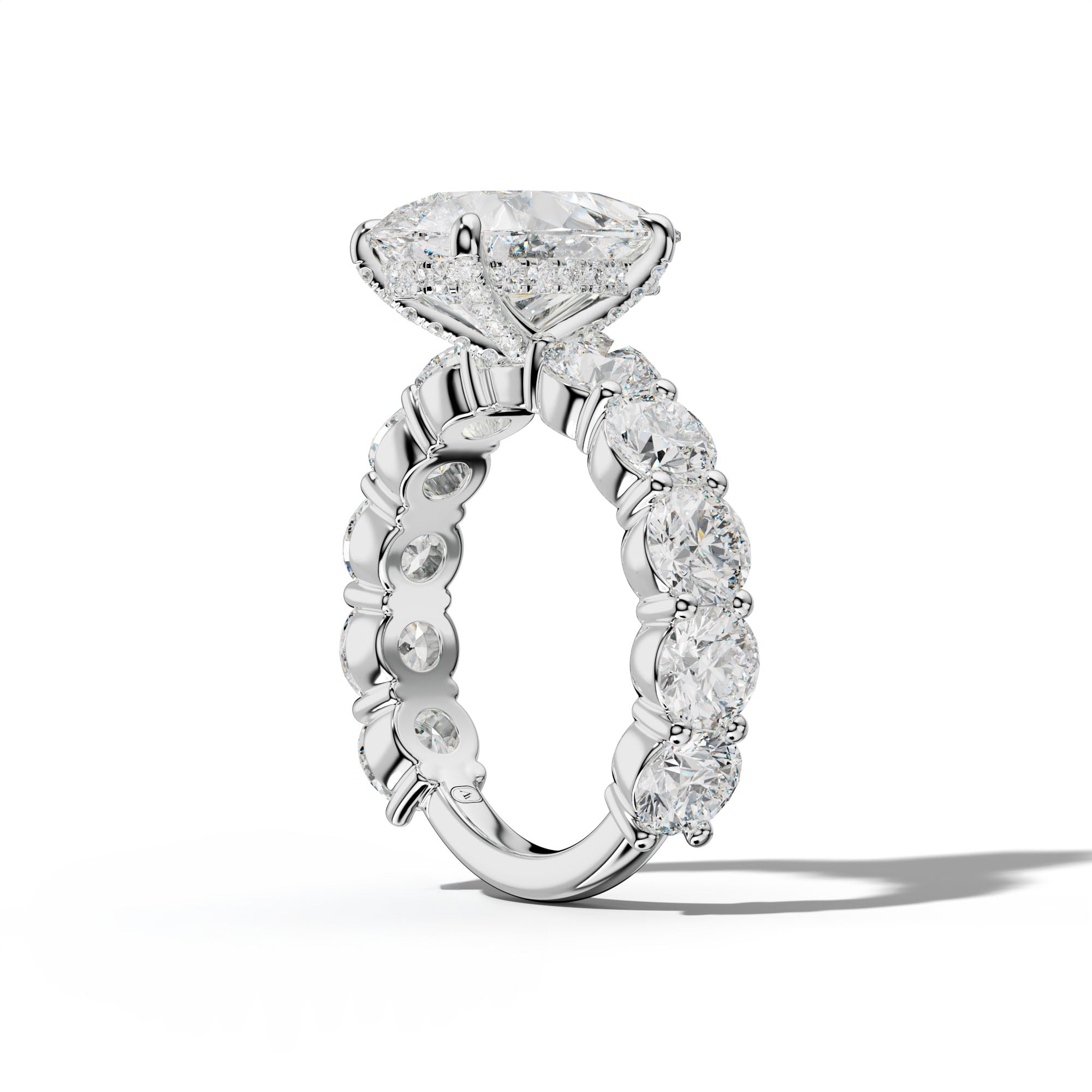 Marley Pear Shape Engagement Ring With Round Side Stones