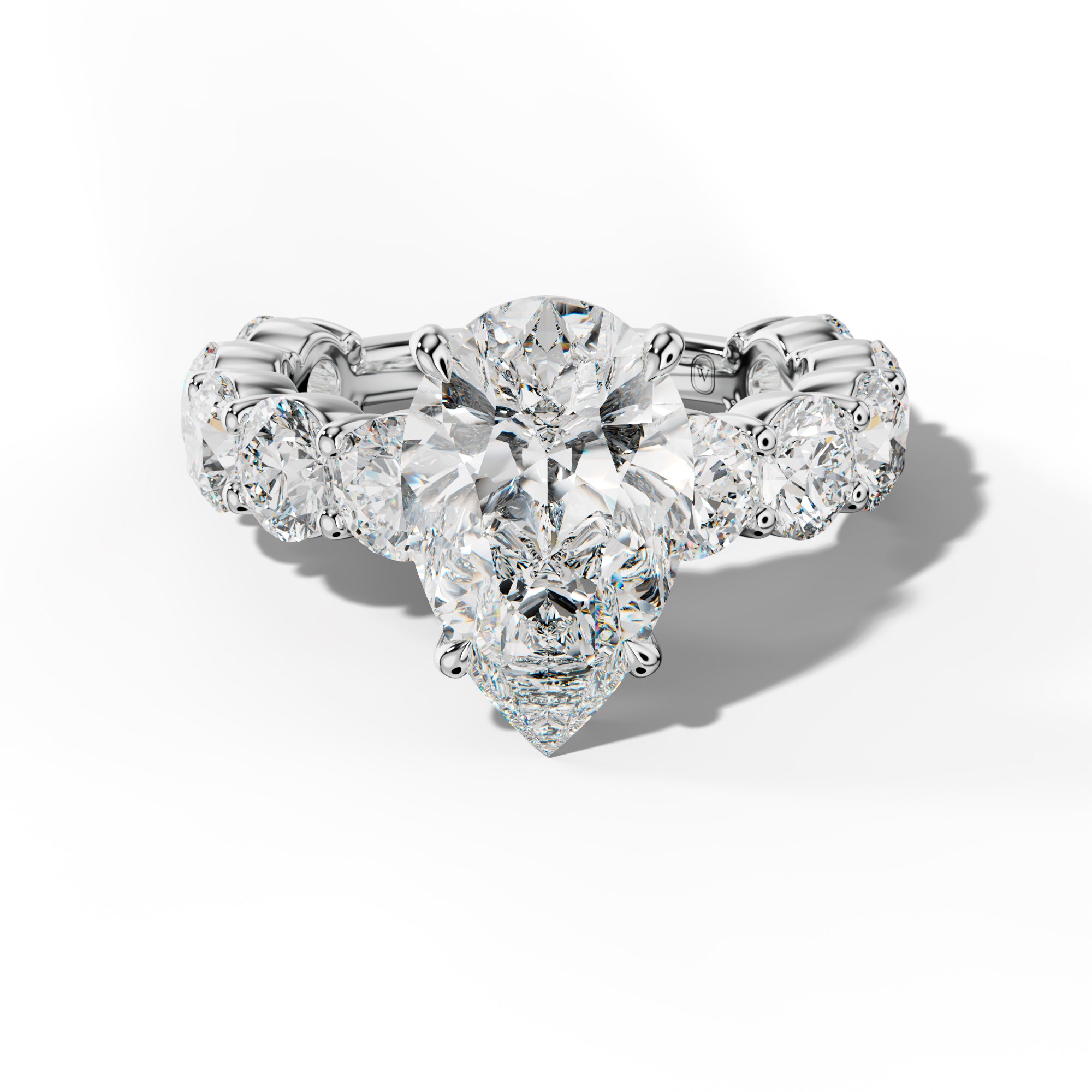 Marley Pear Shape Engagement Ring With Round Side Stones