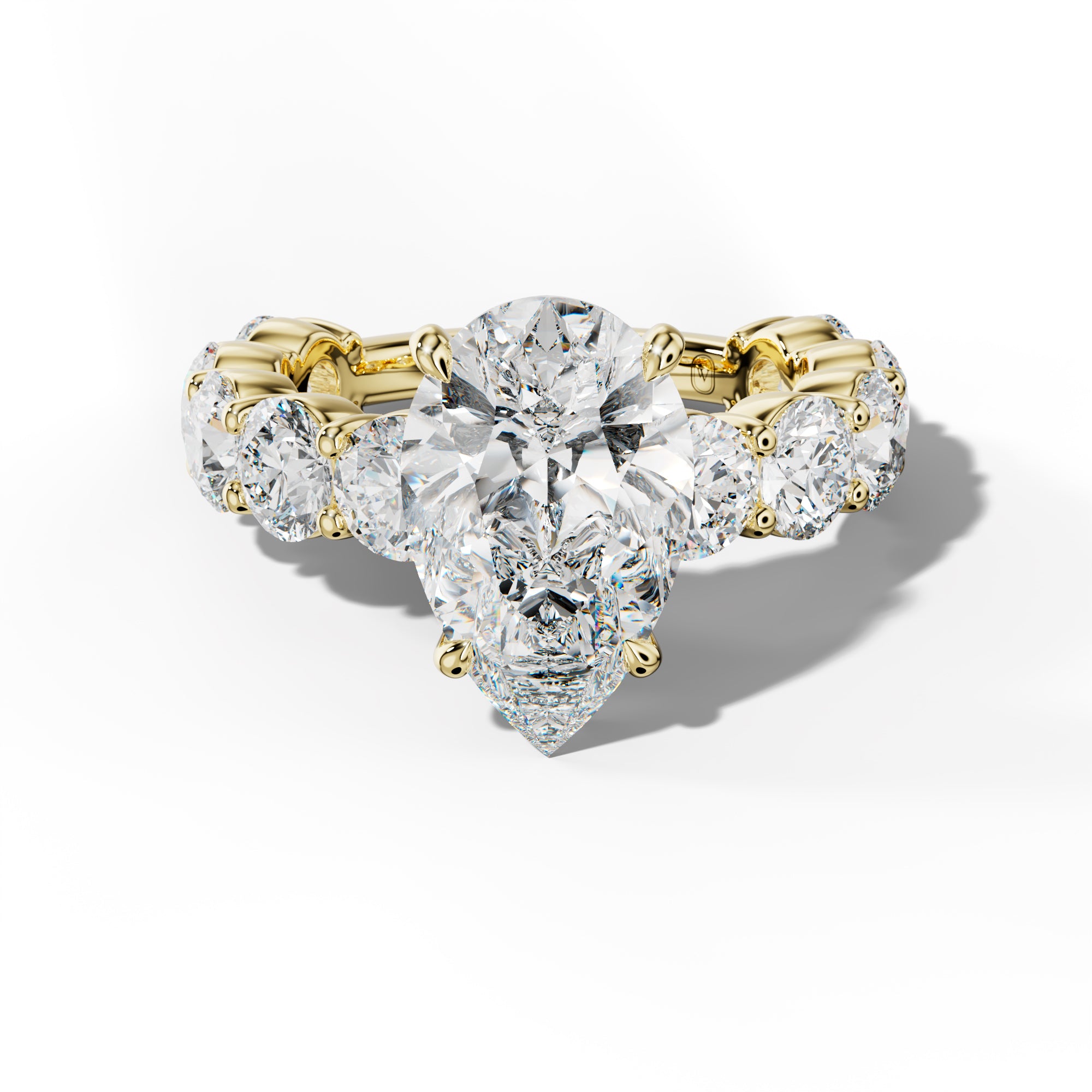 Marley Pear Shape Engagement Ring With Round Side Stones