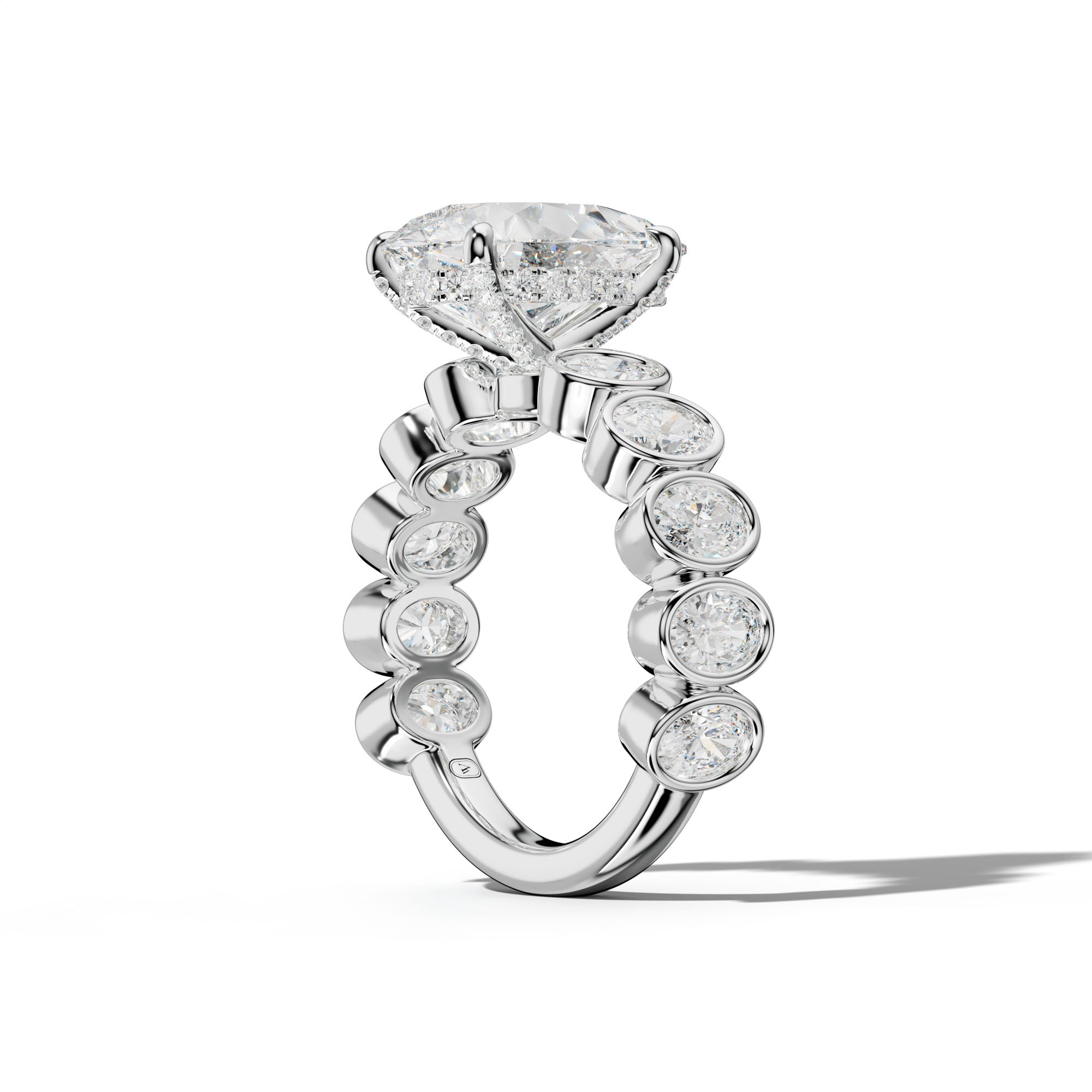 Linda Pear Shape Engagement Ring With Oval Side Stones