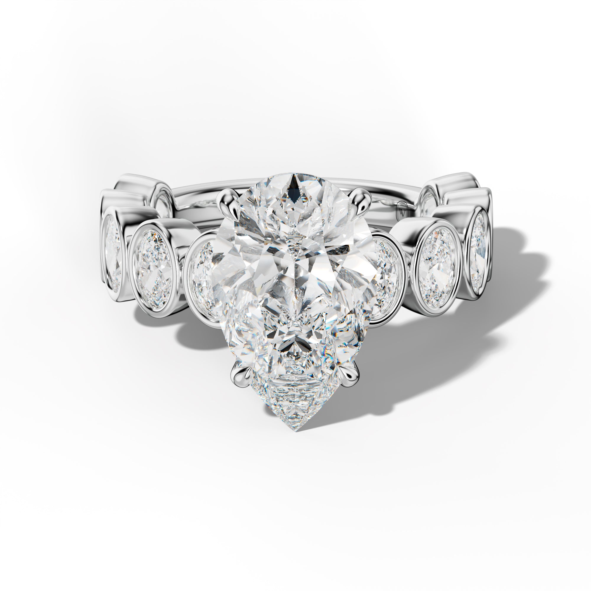 Linda Pear Shape Engagement Ring With Oval Side Stones