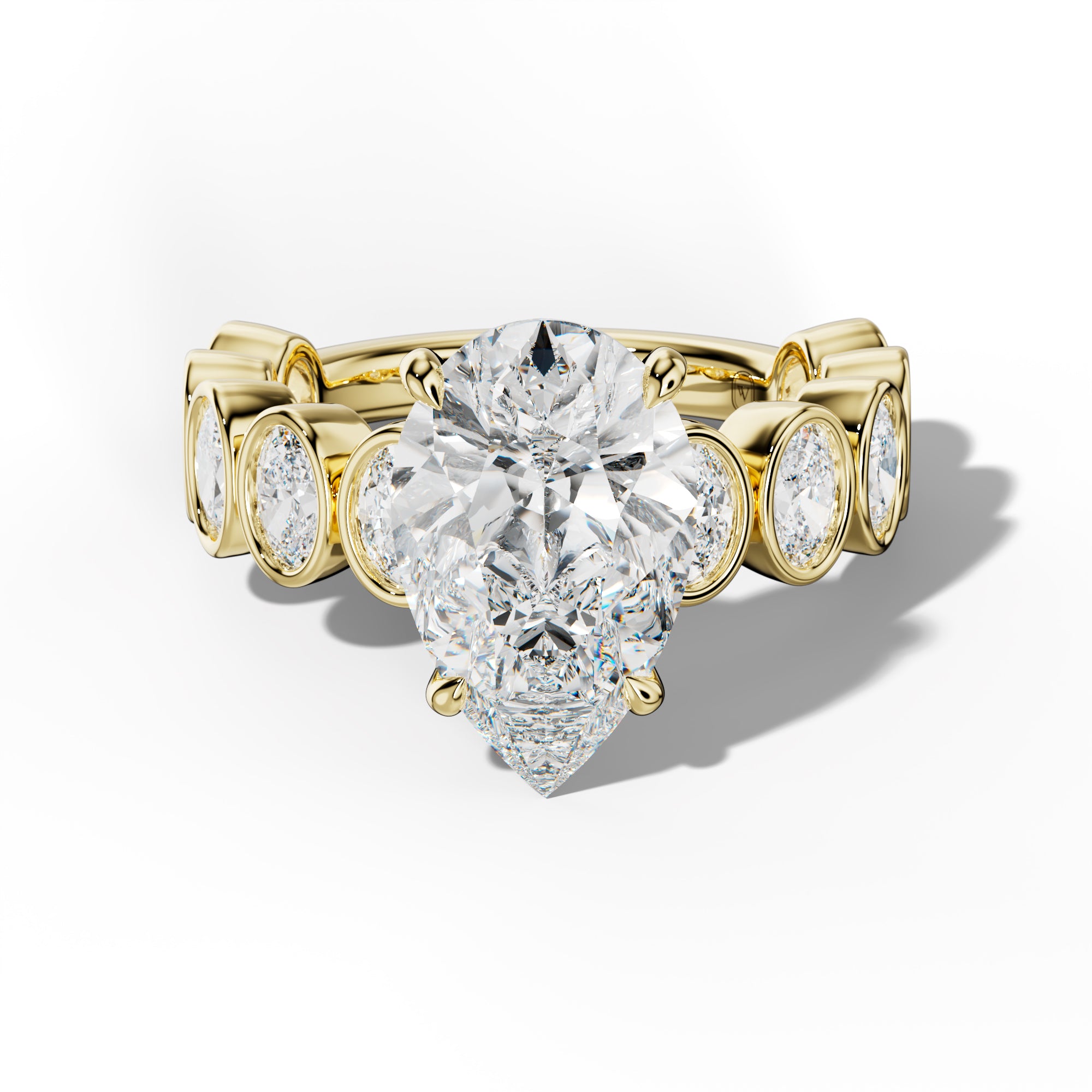 Linda Pear Shape Engagement Ring With Oval Side Stones