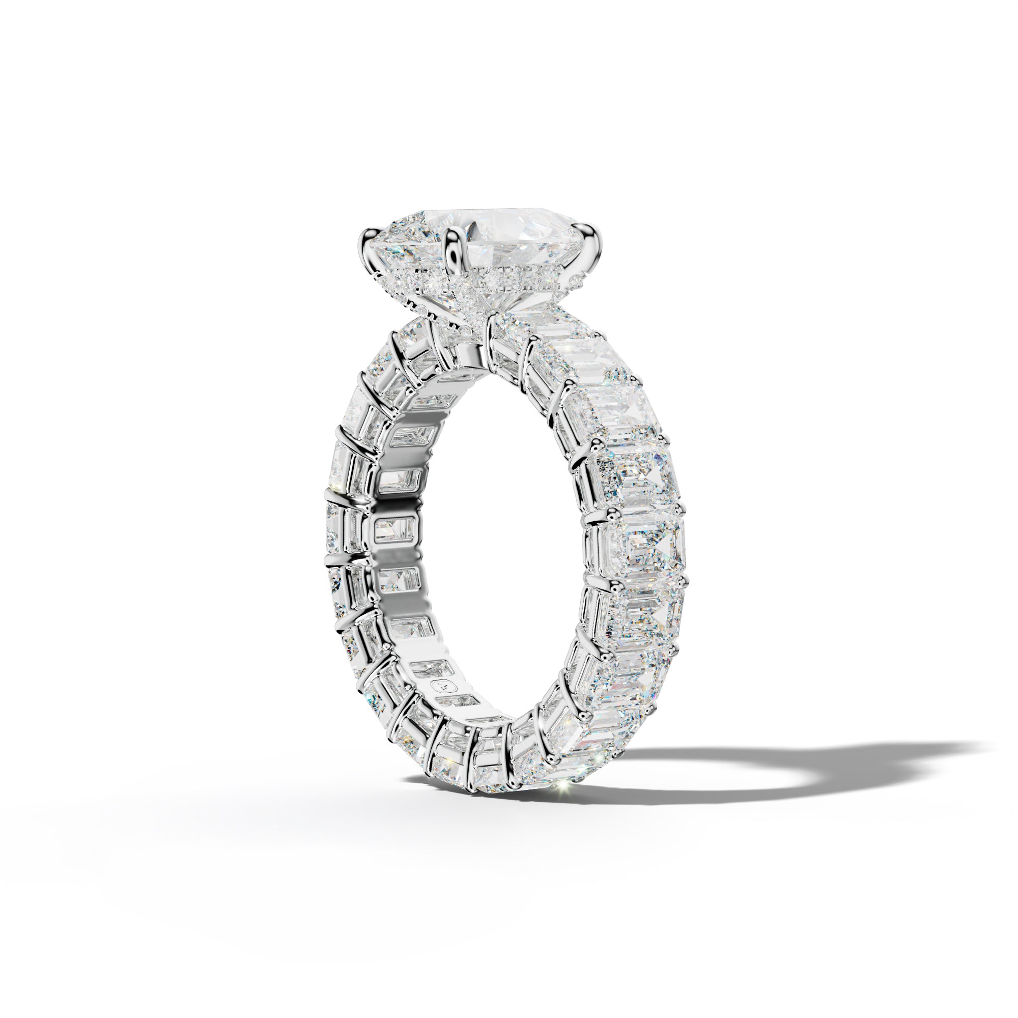 Jazmine Pear Shape Engagement Ring With Emerald Cut Side Stones