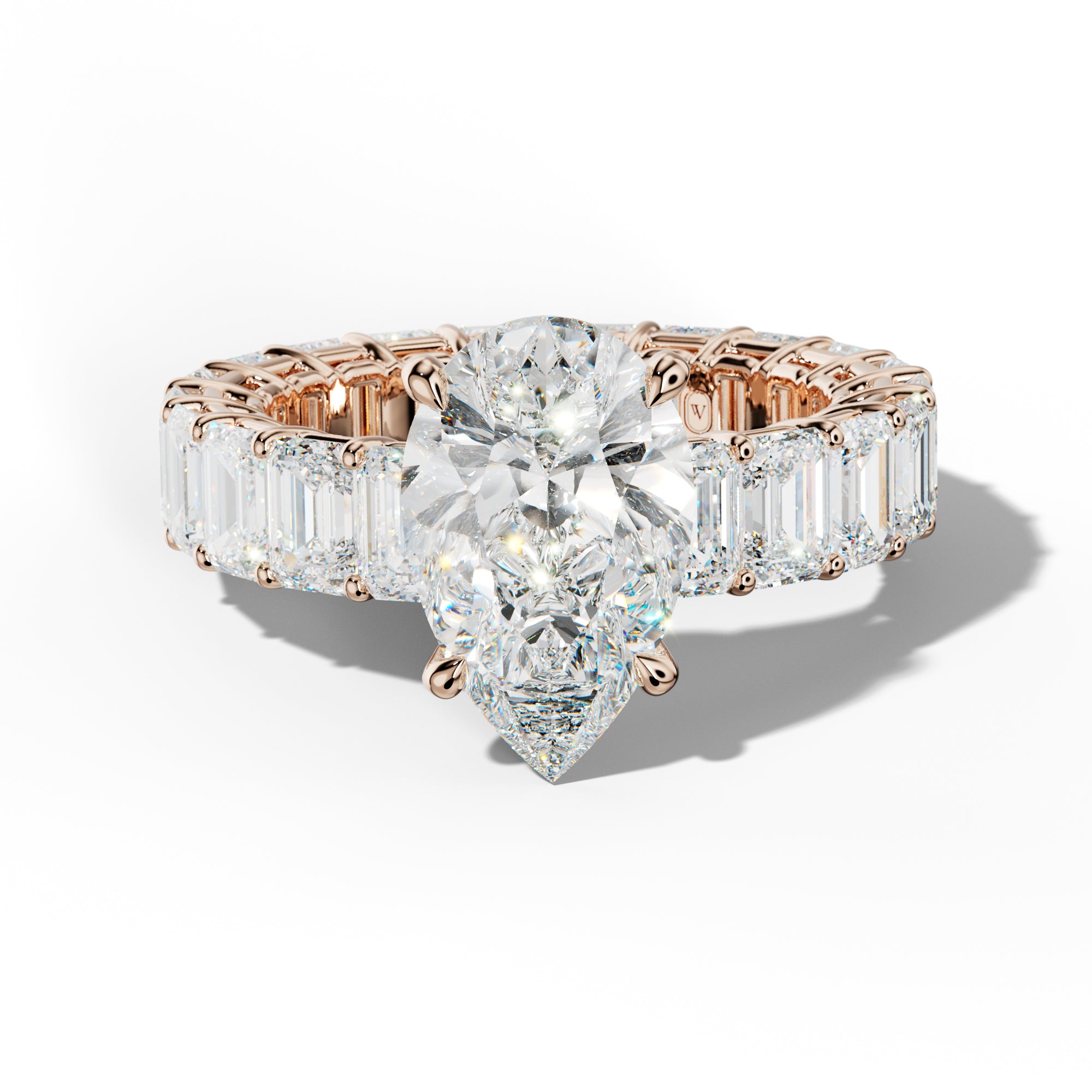 Jazmine Pear Shape Engagement Ring With Emerald Cut Side Stones