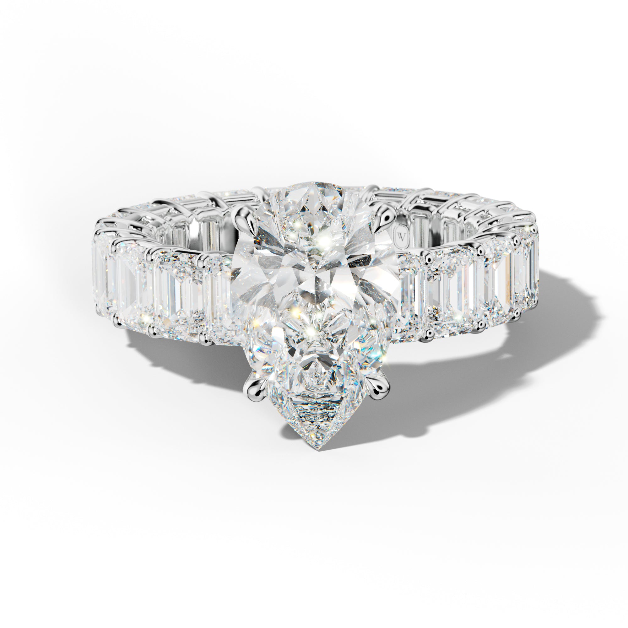 Jazmine Pear Shape Engagement Ring With Emerald Cut Side Stones