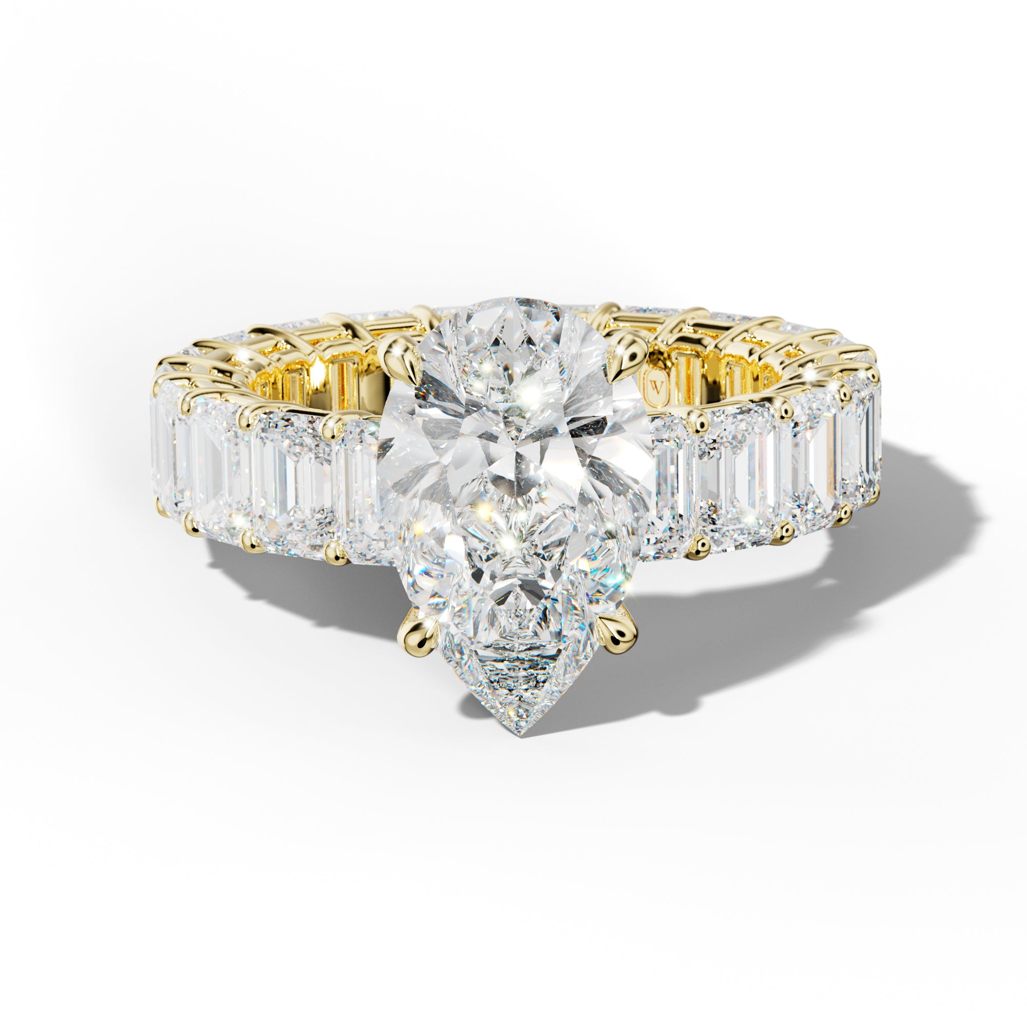 Jazmine Pear Shape Engagement Ring With Emerald Cut Side Stones
