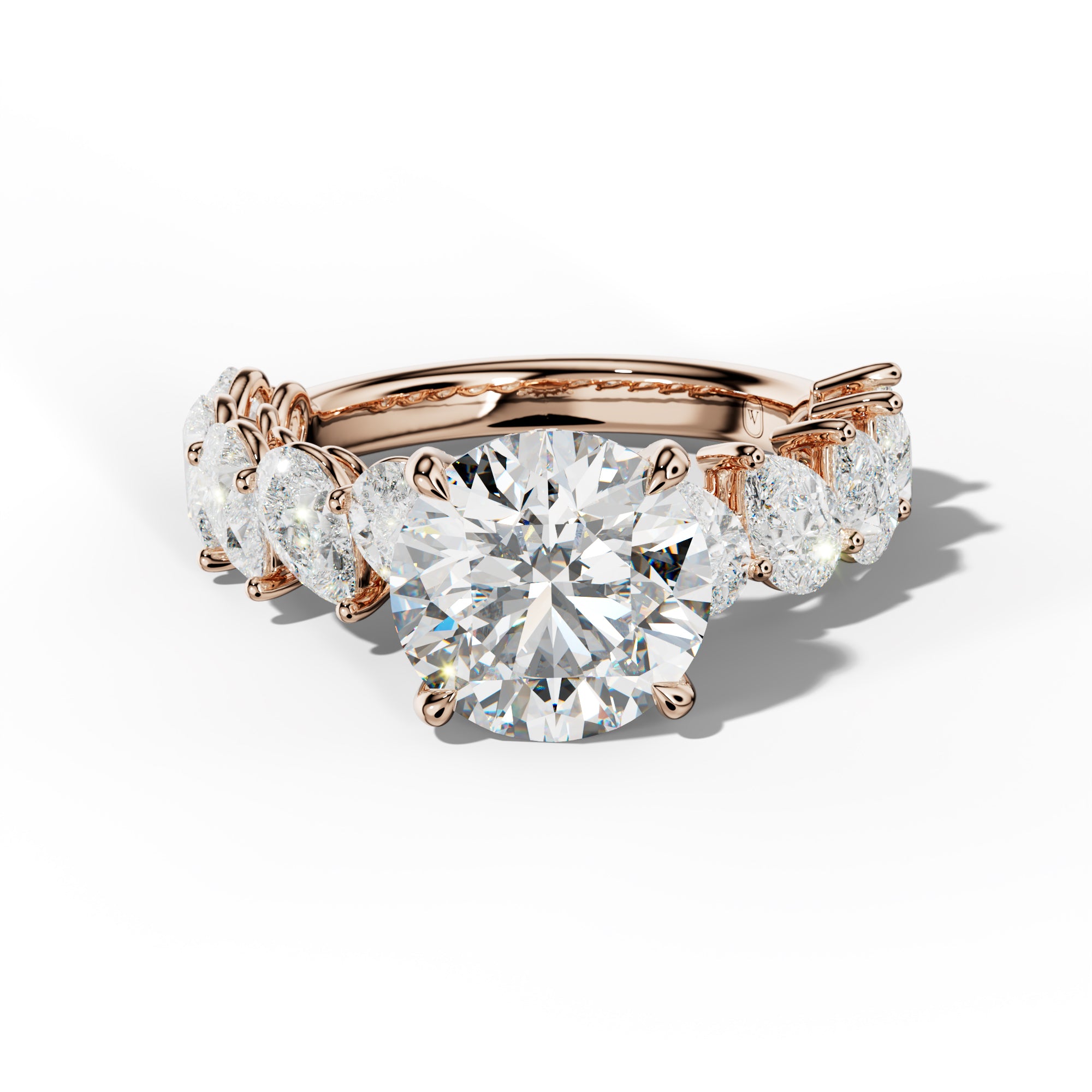 Elisabeth Round Diamond Engagement Ring With Slanted Pear Side Stones