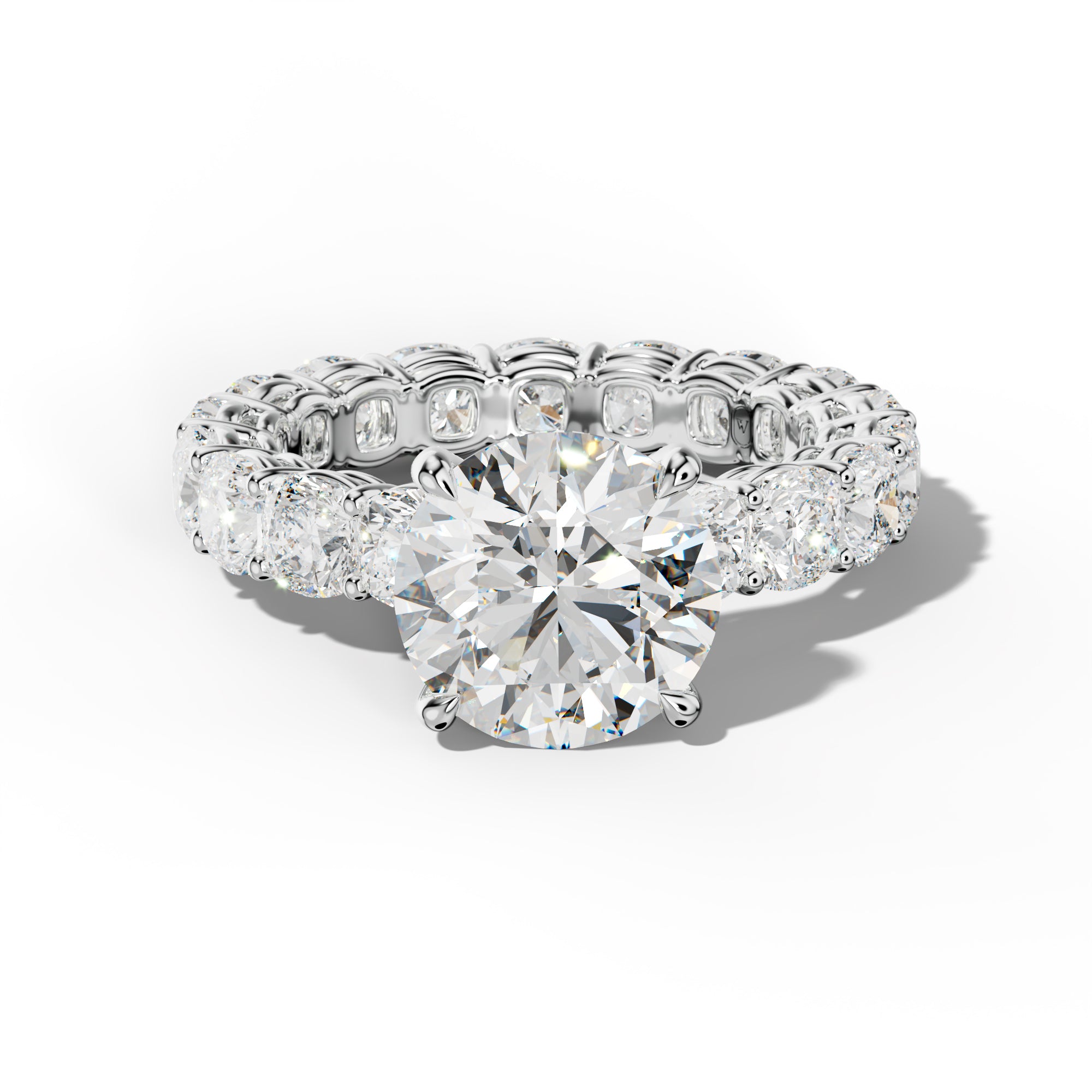 Celine Round Diamond Engagement Ring With Cushion Side Stones