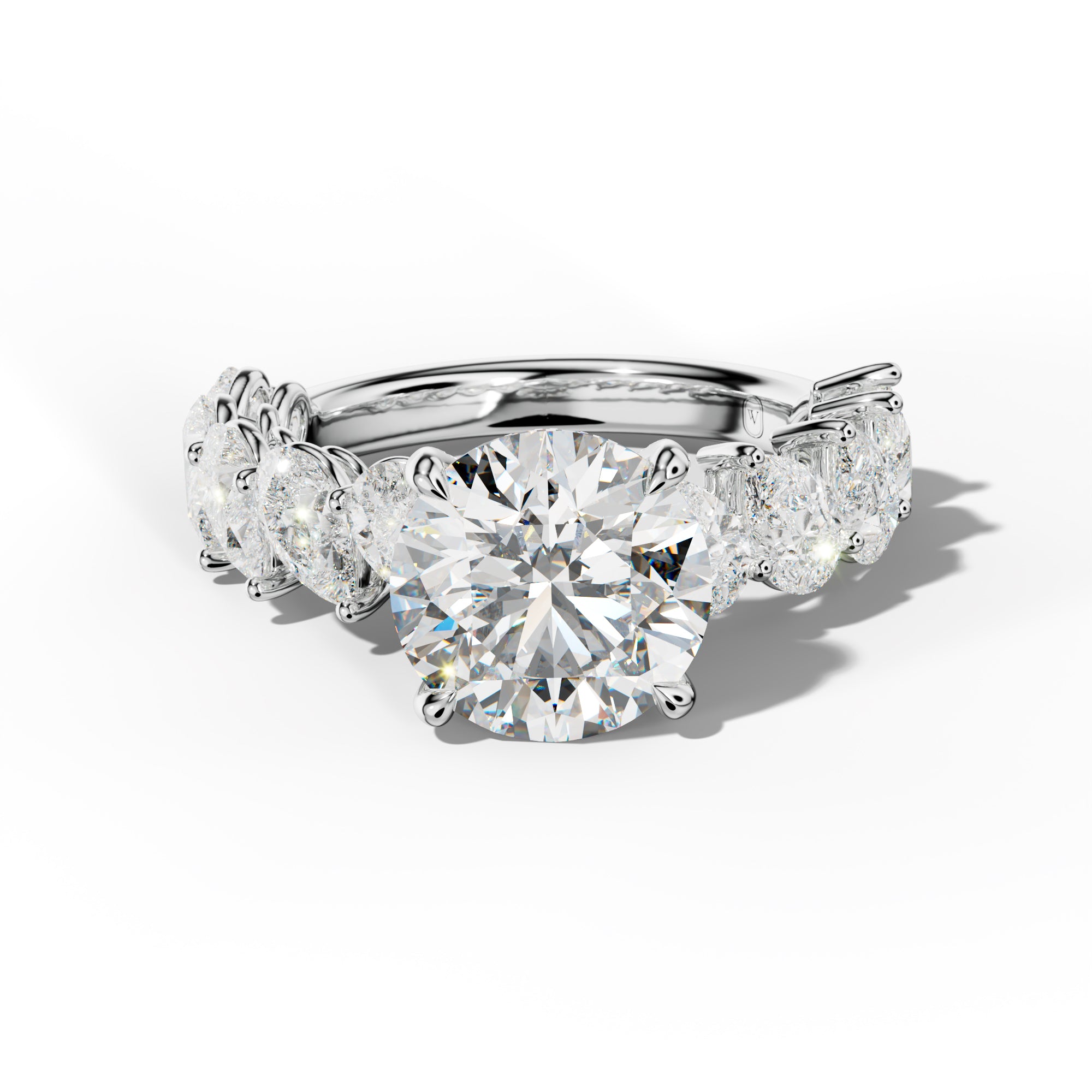 Elisabeth Round Diamond Engagement Ring With Slanted Pear Side Stones