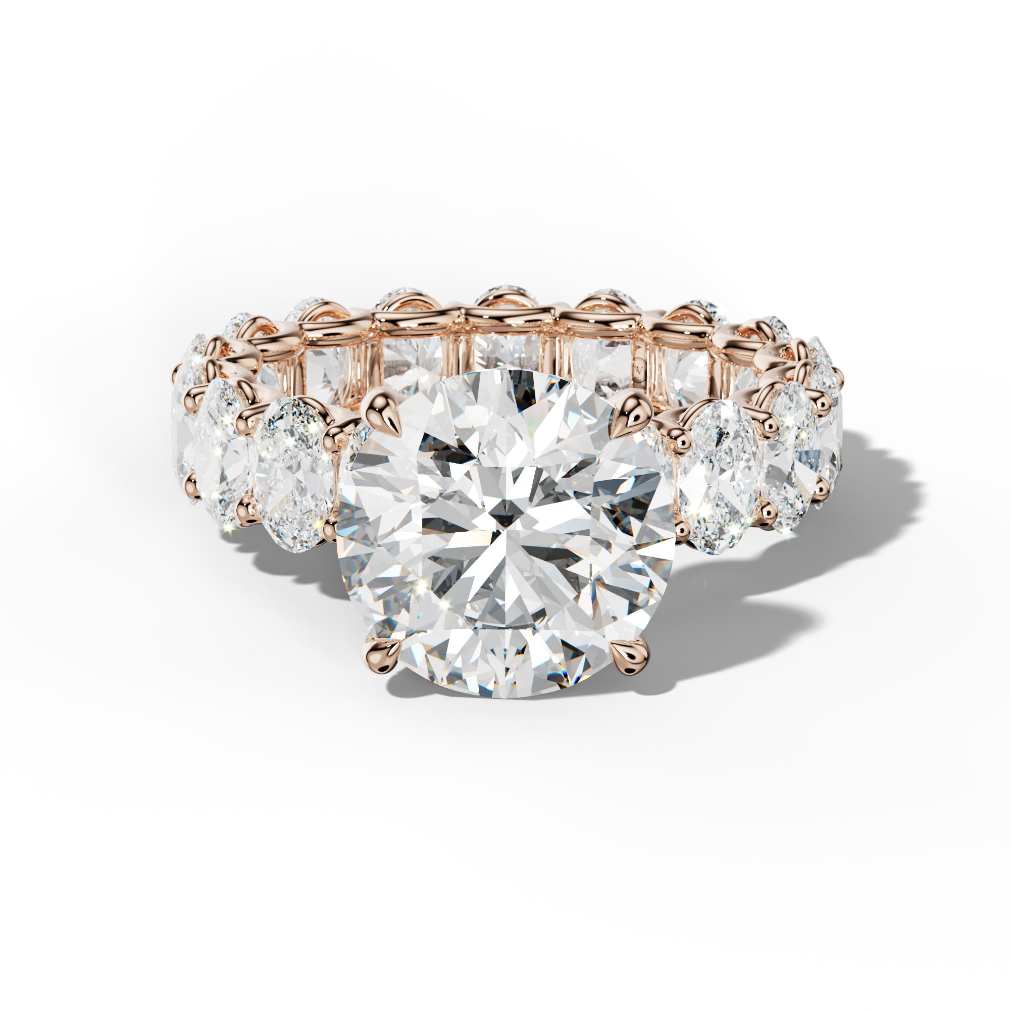 Helena Round Diamond Engagement Ring With Oval Side Stones
