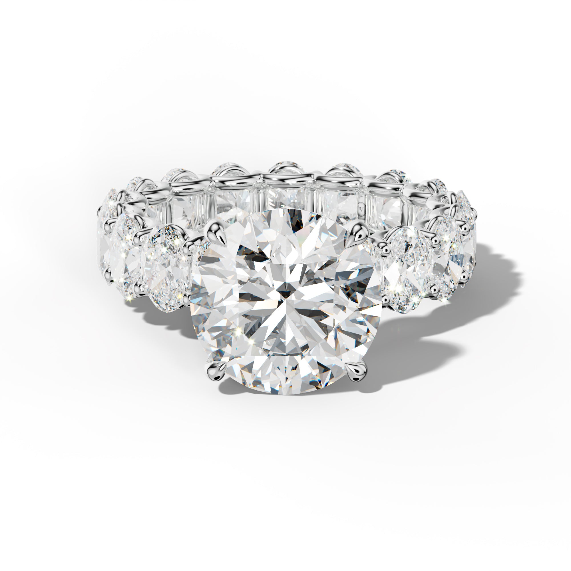 Helena Round Diamond Engagement Ring With Oval Side Stones