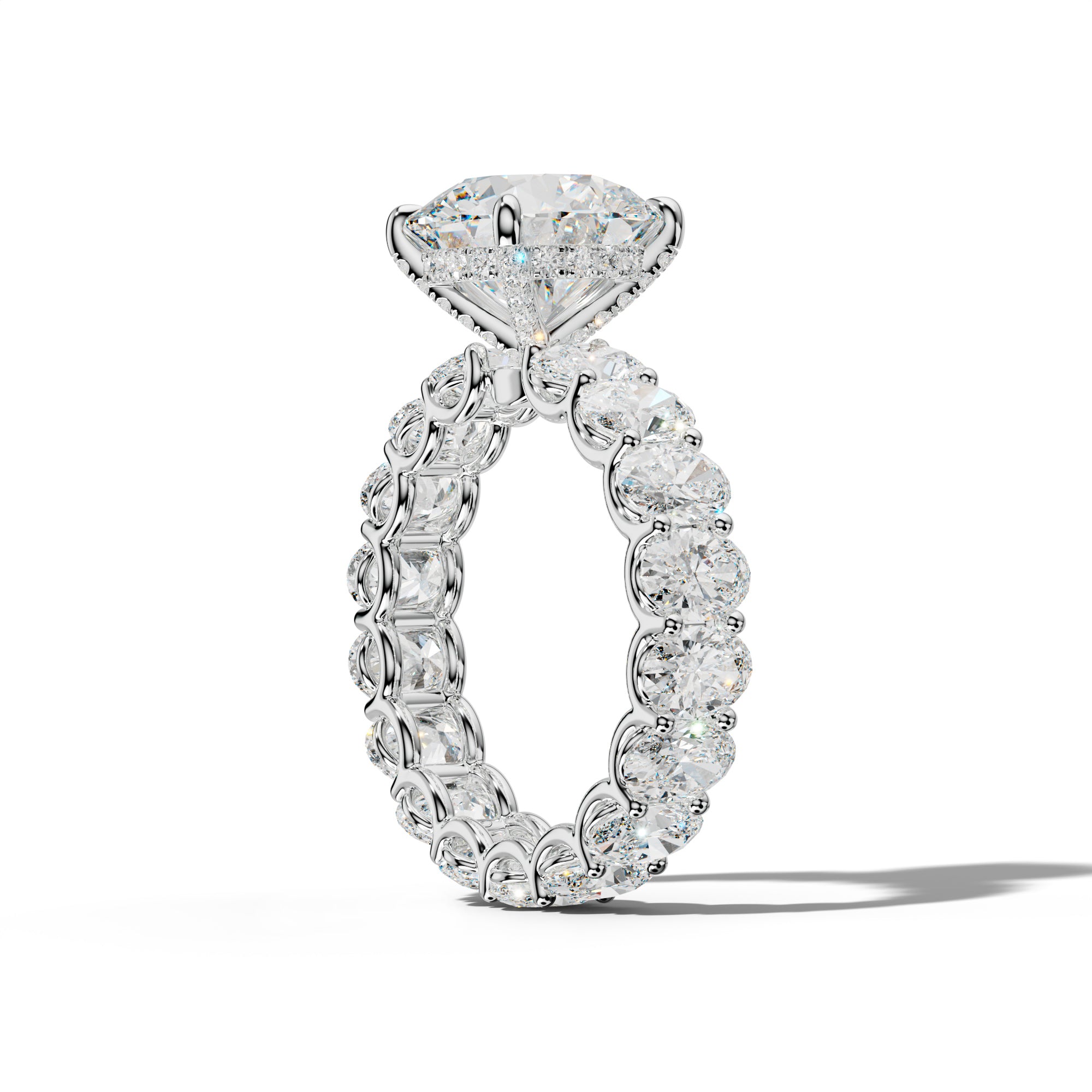 Helena Round Diamond Engagement Ring With Oval Side Stones